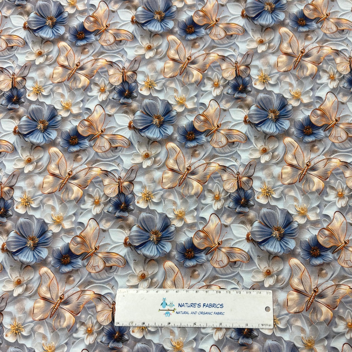 Gold Butterflies on Light Blue Organic Cotton/Spandex Jersey Fabric