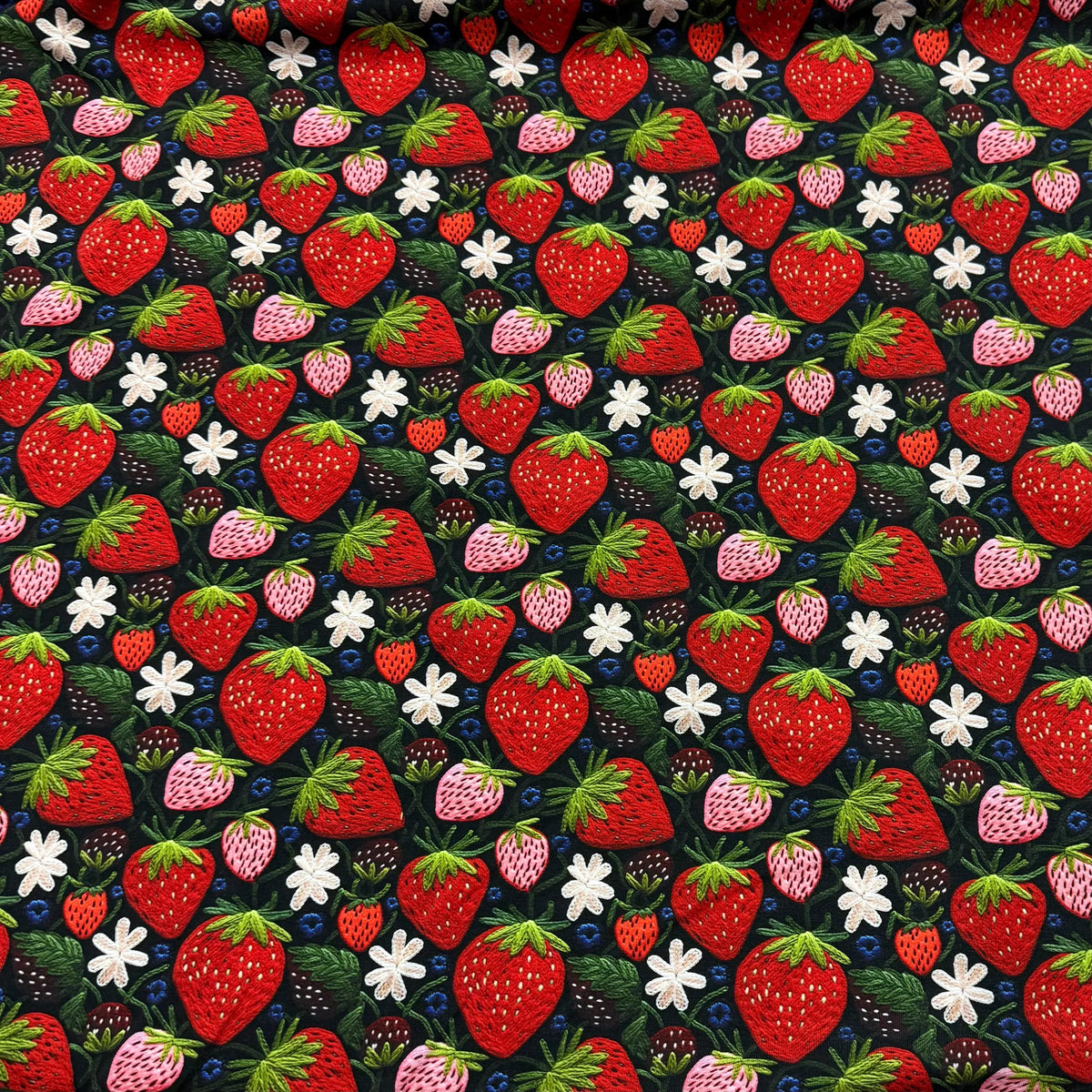 Strawberry print fabric with embroidered berries and flowers by Nature's Fabrics
