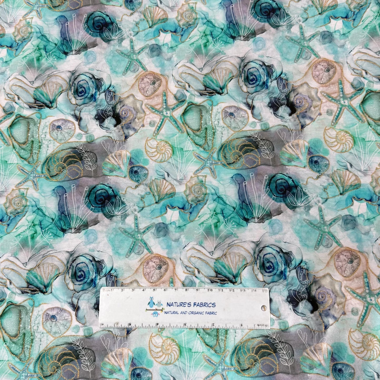 Starfish and Shells on Marble Bamboo/Spandex Jersey Fabric