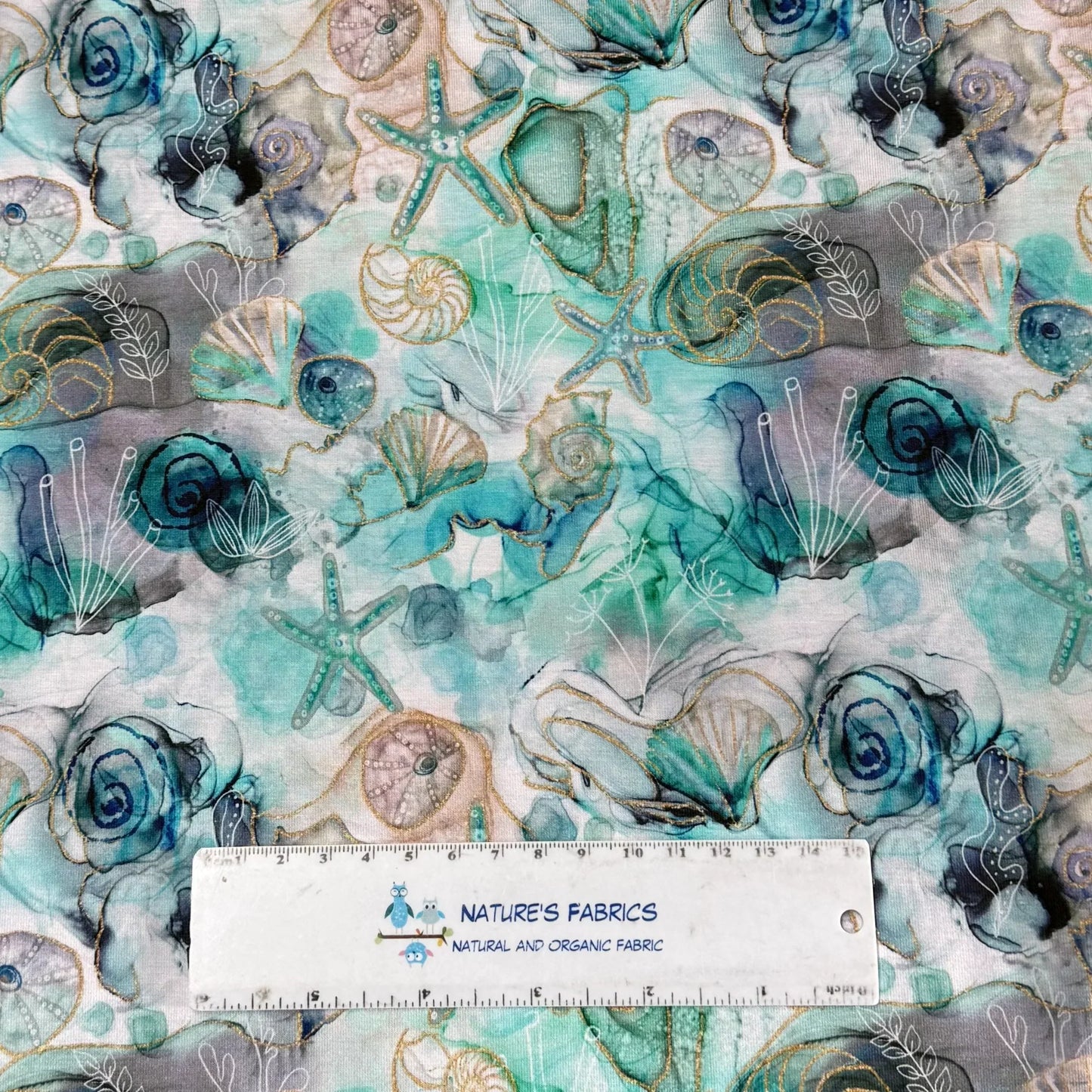 Starfish and Shells on Marble Bamboo/Spandex Jersey Fabric