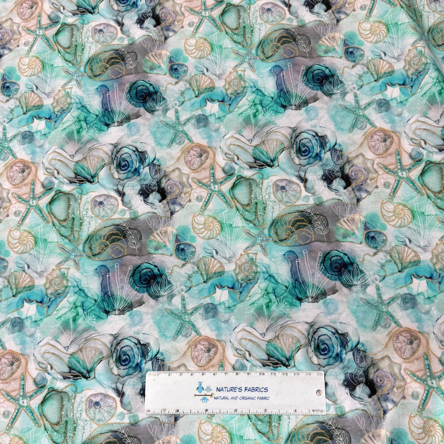 Starfish and Shells on Marble Bamboo/Spandex Jersey Fabric
