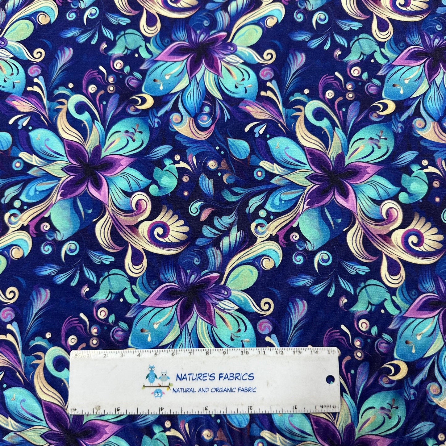 Aqua and Purple Floral on Navy on Bamboo/Spandex Jersey Fabric - Nature's Fabrics