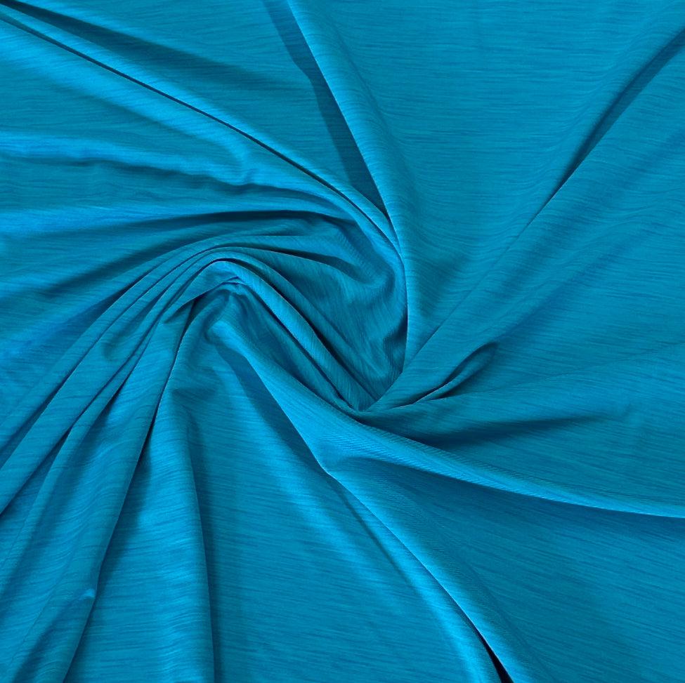 Aqua Blue Space Dye on Poly/Spandex Jersey Fabric - Nature's Fabrics