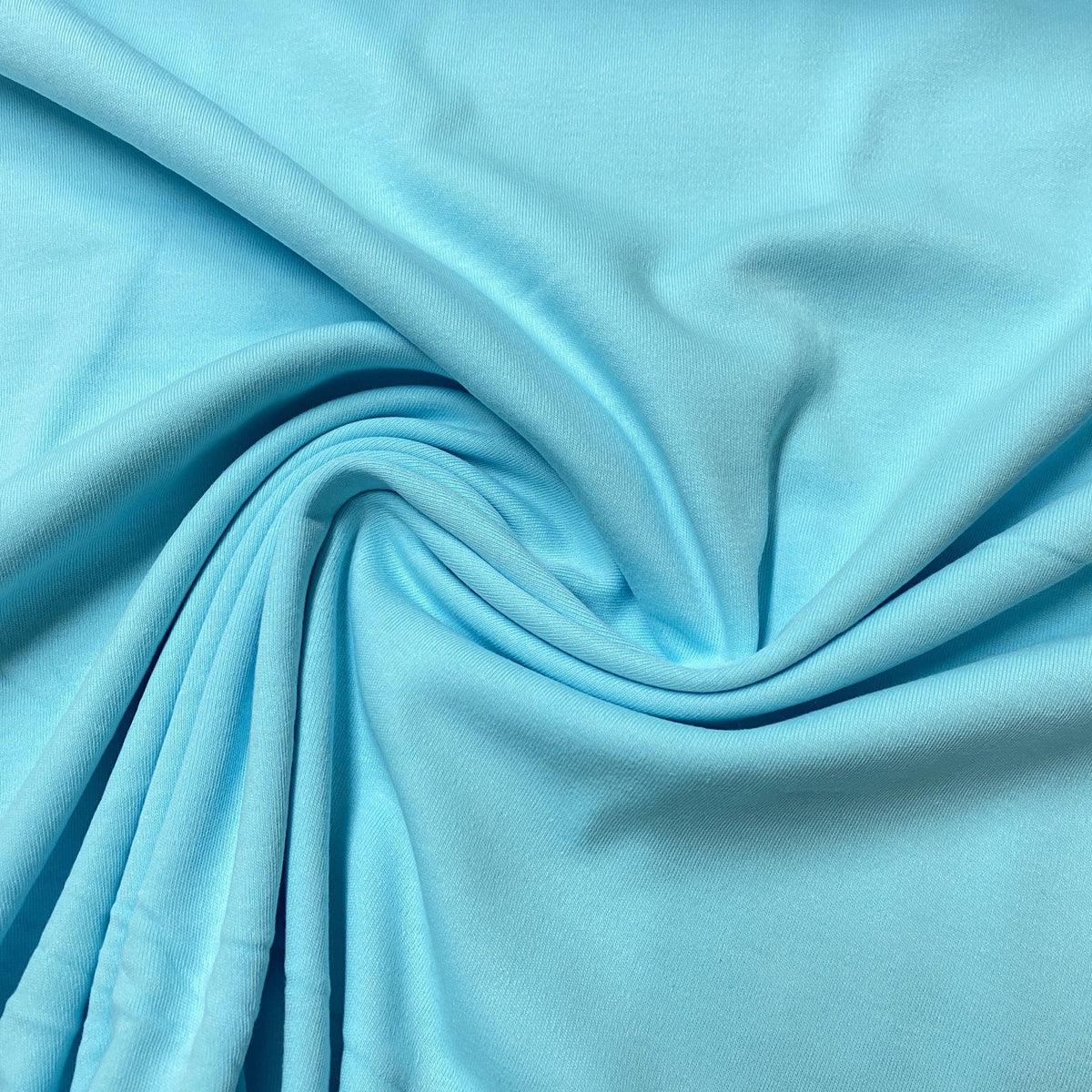 Soft light blue organic cotton fabric by Nature's Fabrics, eco-friendly and premium quality