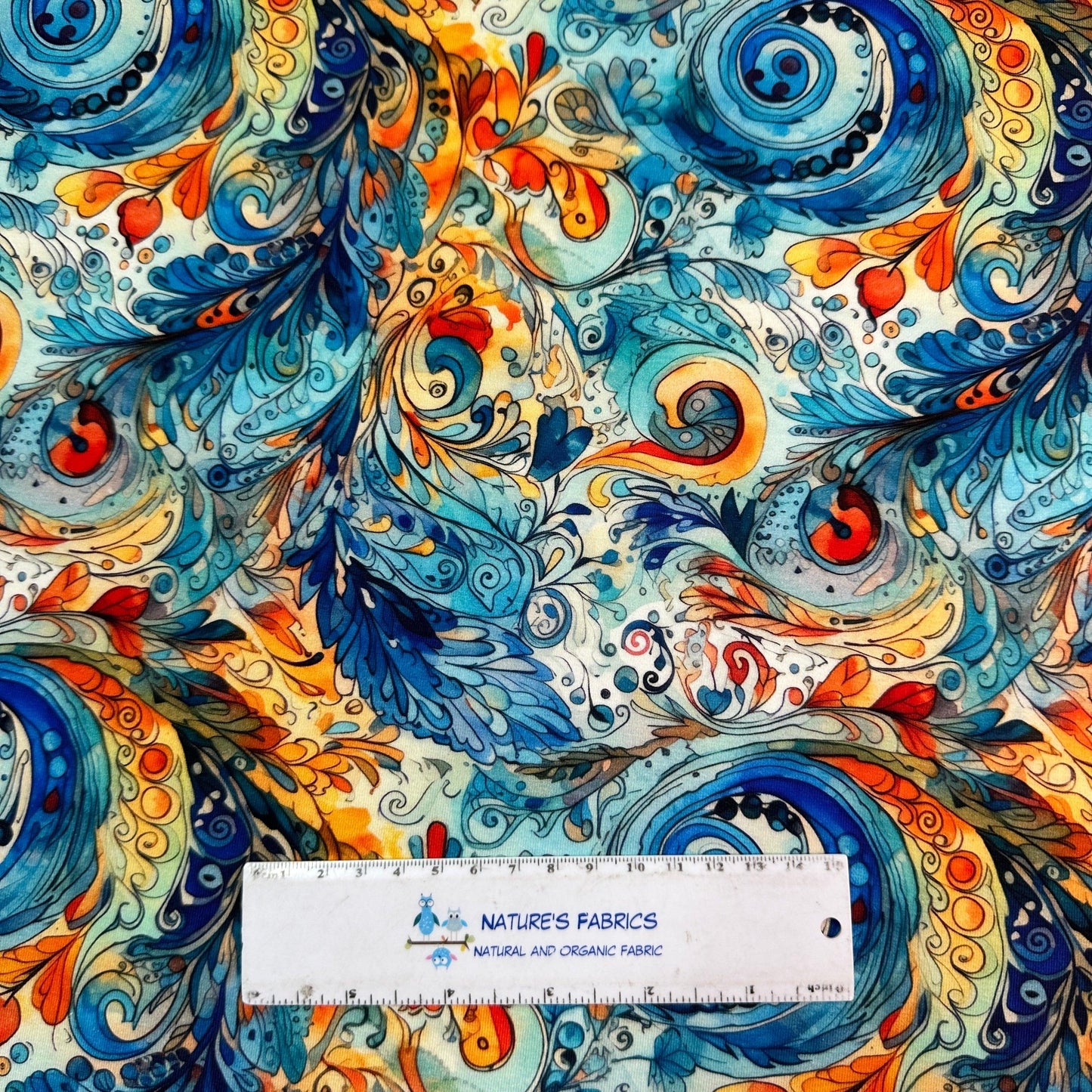Blue and Orange Paisley on Bamboo Stretch French Terry Fabric - Nature's Fabrics