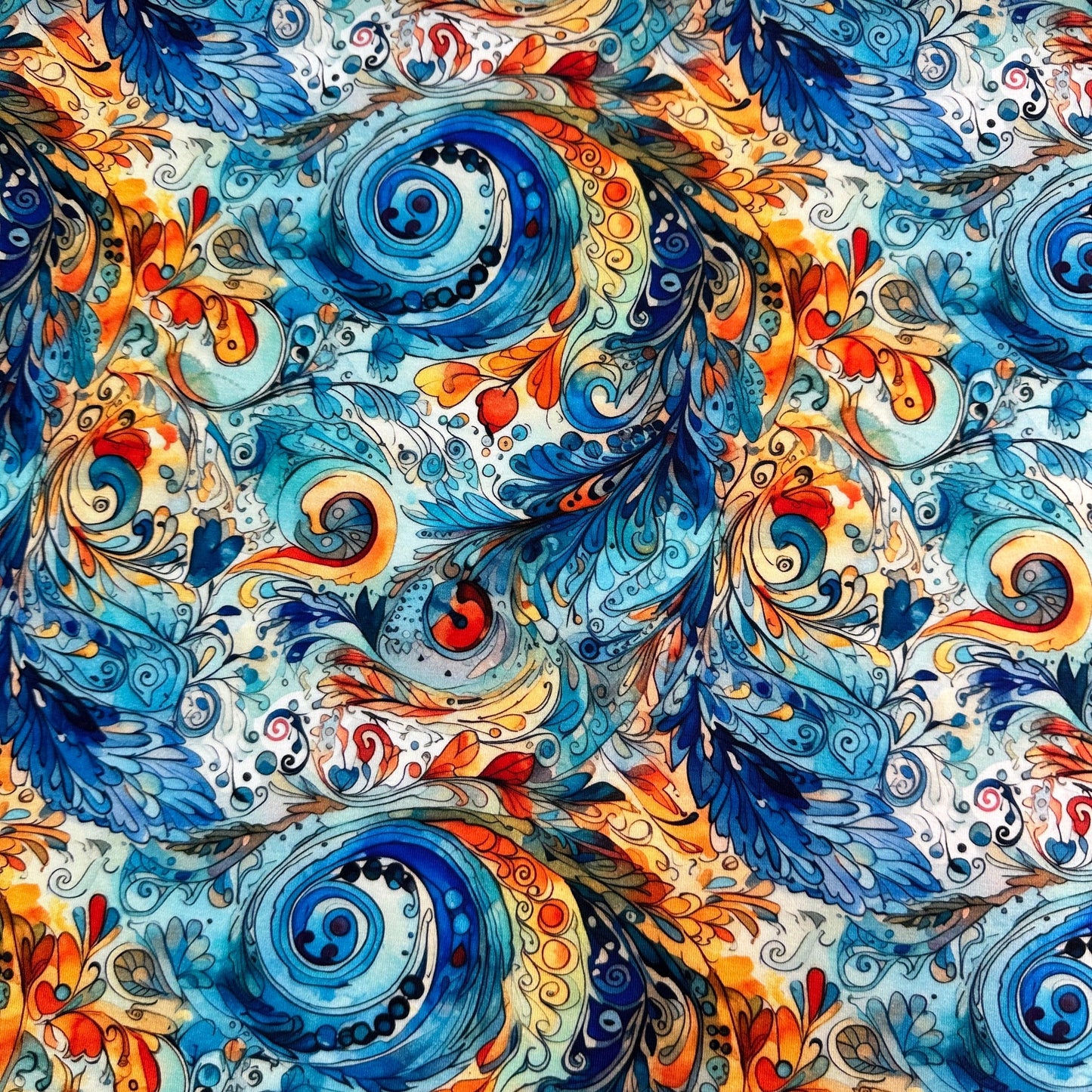Blue and Orange Paisley on Organic Cotton/Spandex Jersey Fabric - Nature's Fabrics