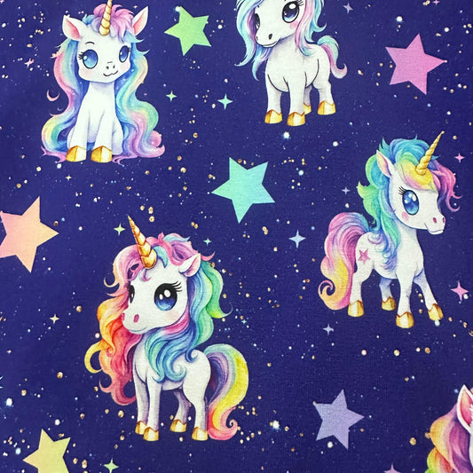 Cartoon Unicorns on Organic Cotton/Spandex Jersey Fabric - Nature's Fabrics