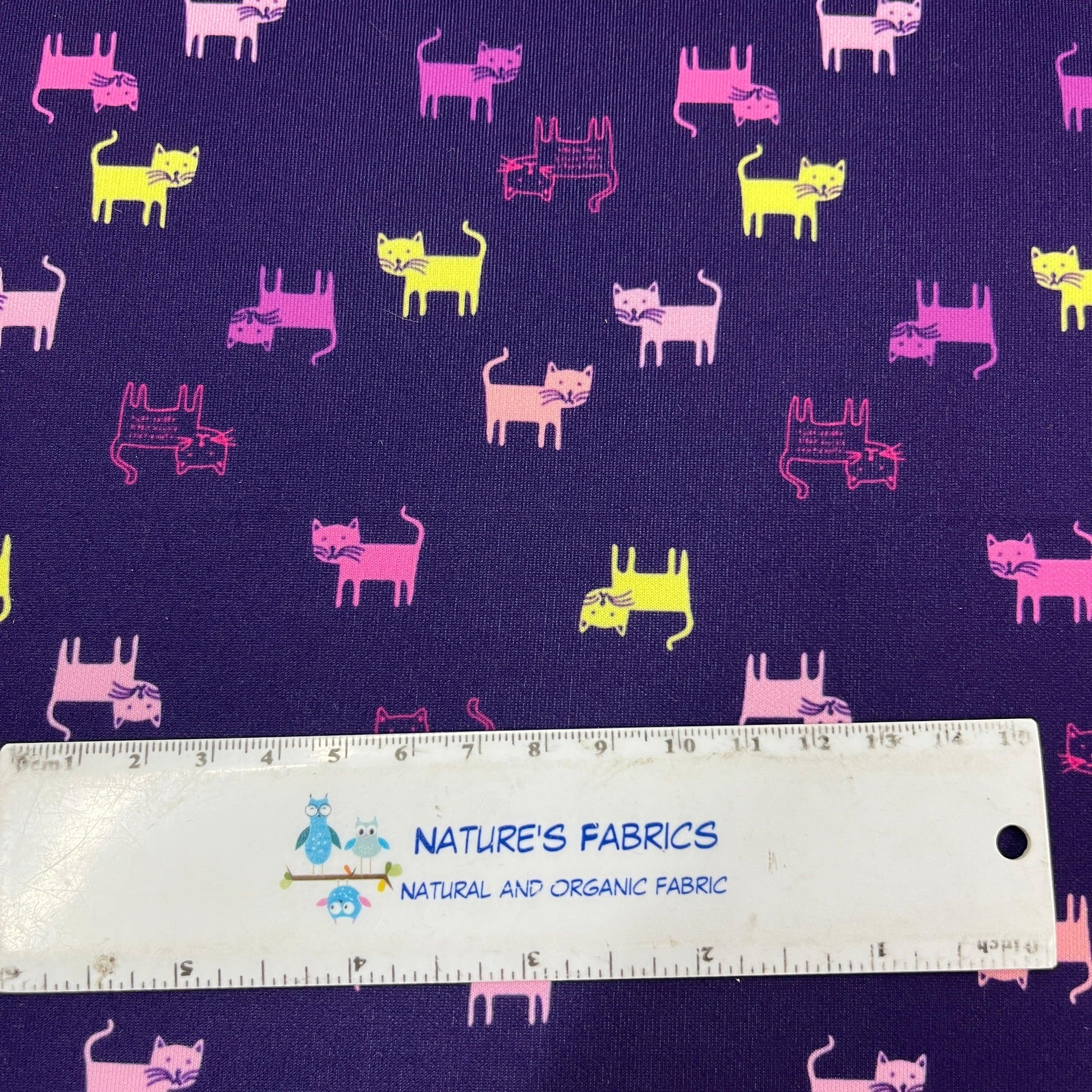 Cats on Purple Athletic Jersey Fabric - Nature's Fabrics