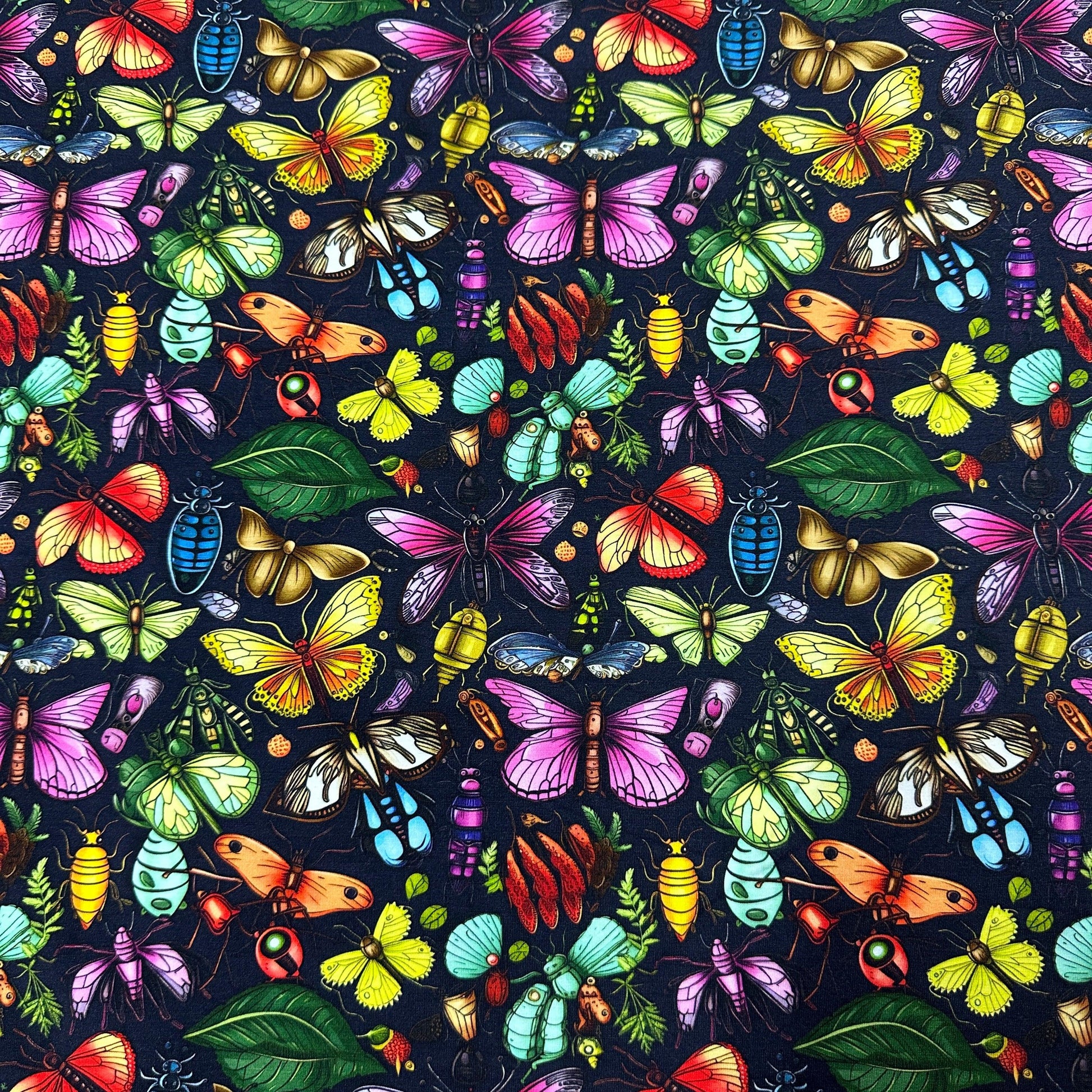 Colorful Bugs on Black Bamboo/Spandex Jersey Fabric - Nature's Fabrics