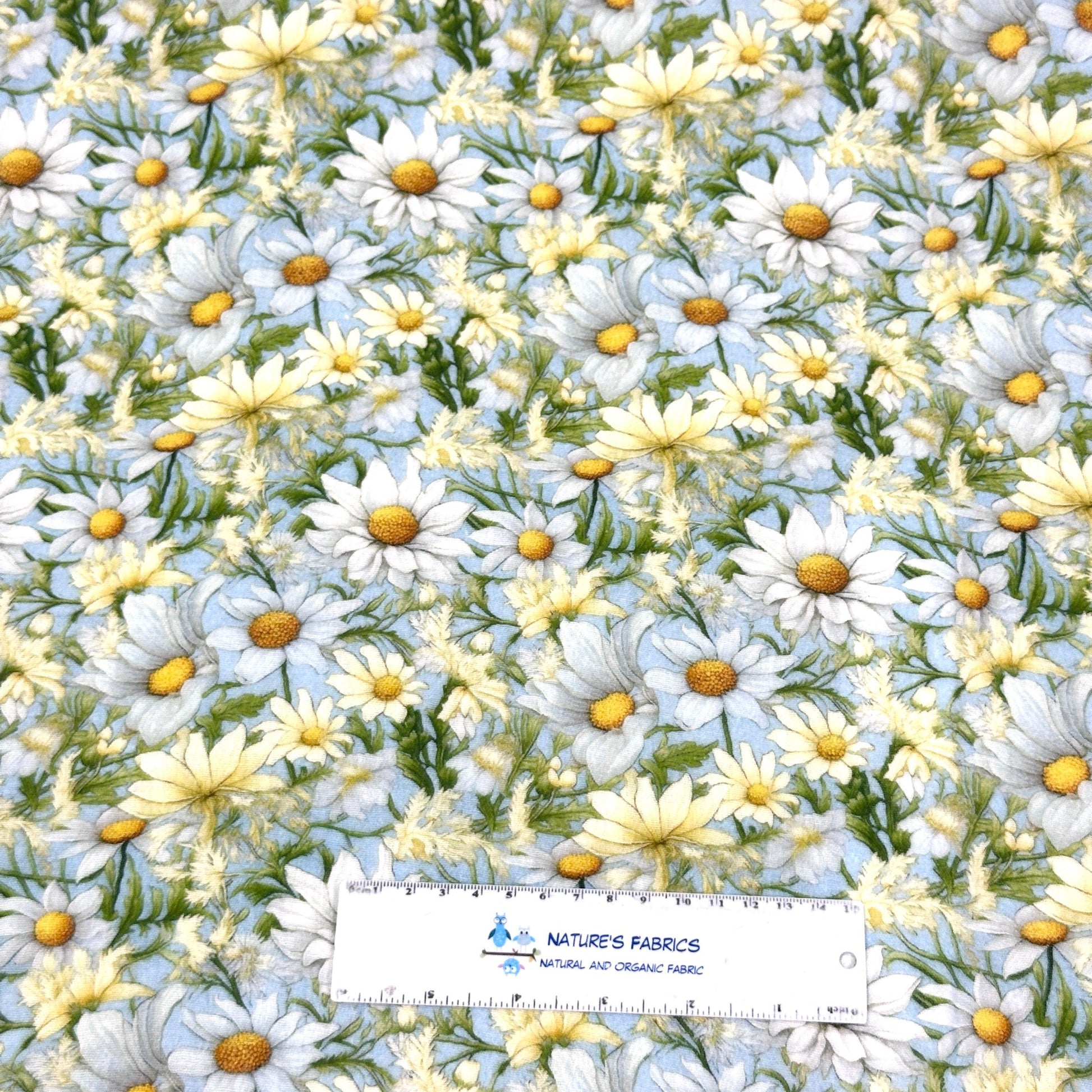 Daisies on Light Blue Double Gauze Muslin Fabric - Nature's Fabrics