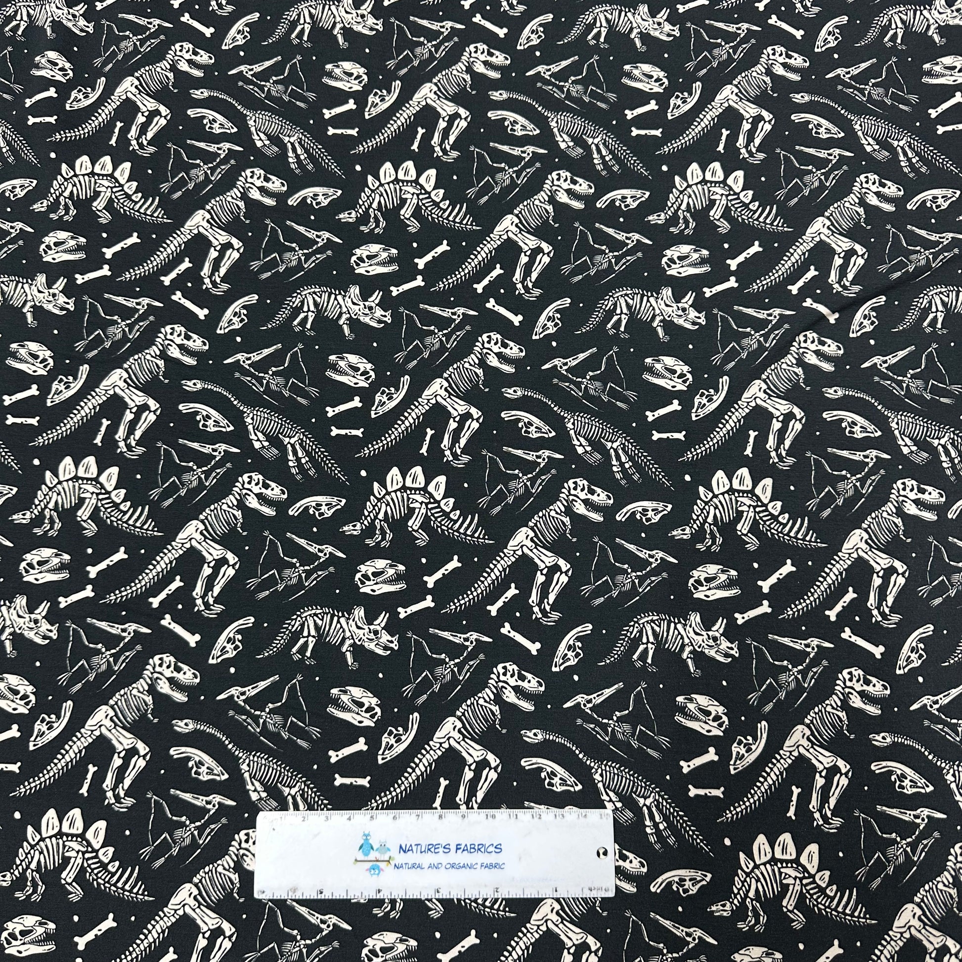 Dino Skeletons on Bamboo/Spandex Jersey Fabric - Nature's Fabrics