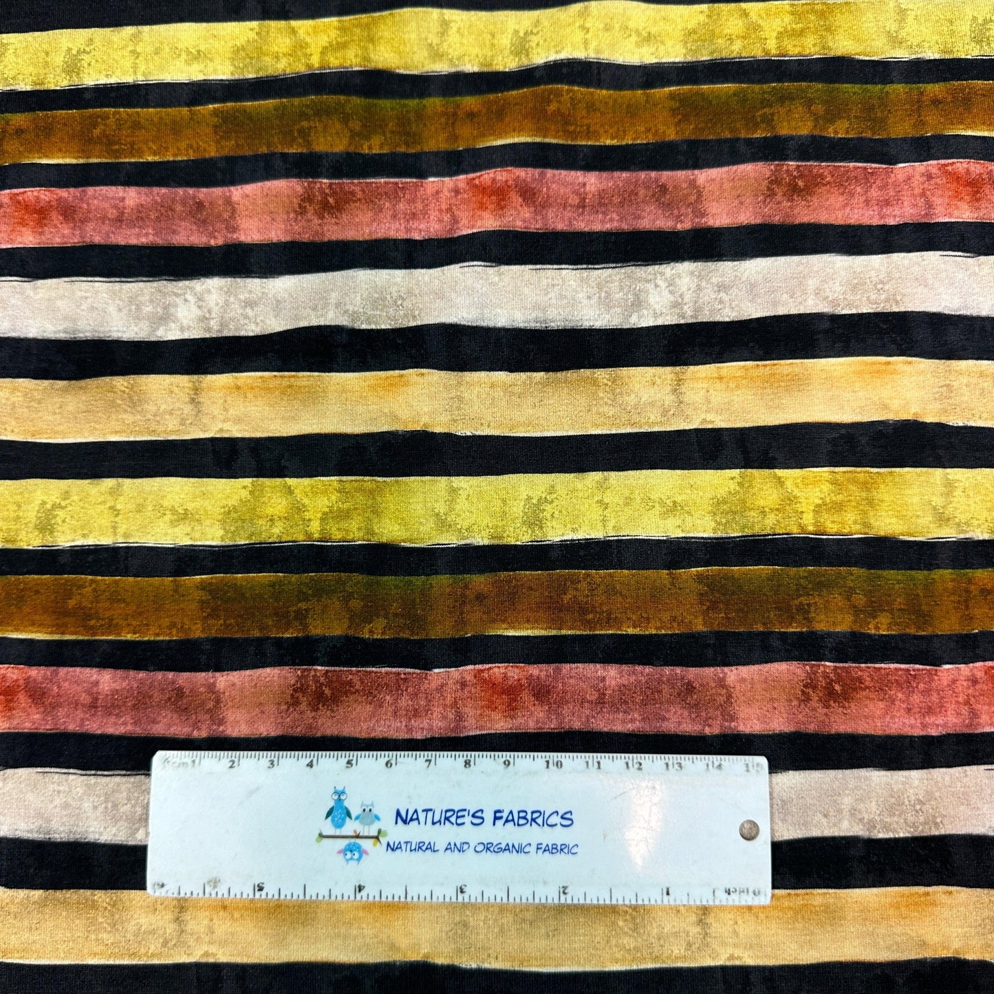 Distressed Earth Tone Stripes on Black Bamboo/Spandex Jersey Fabric - Nature's Fabrics