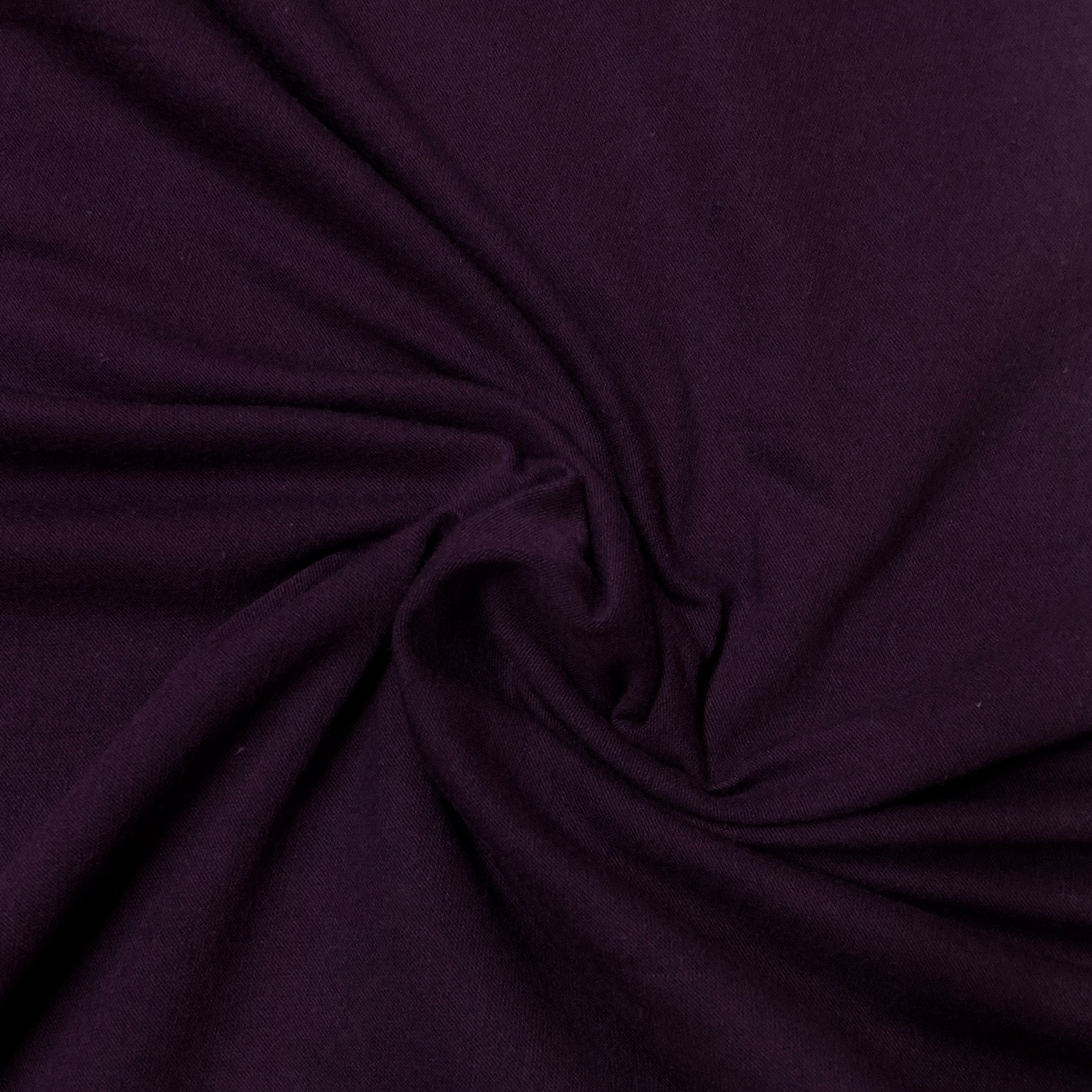 Deep purple organic cotton fabric by Nature's Fabrics, showcasing soft texture and natural drape
