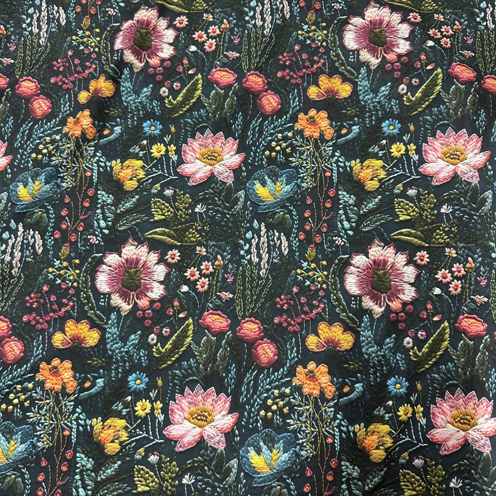 Embroidered Flower Garden on Polyester/Spandex Jersey Fabric - Nature's Fabrics