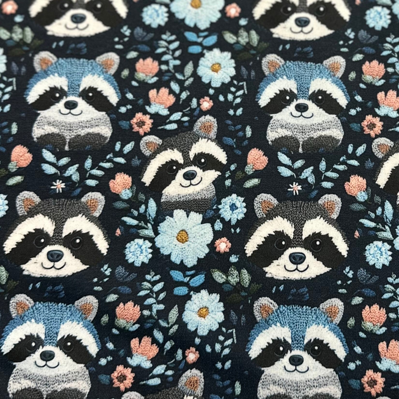 Embroidered Raccoons on Blue 1 mil PUL Fabric - Made in the USA - Nature's Fabrics