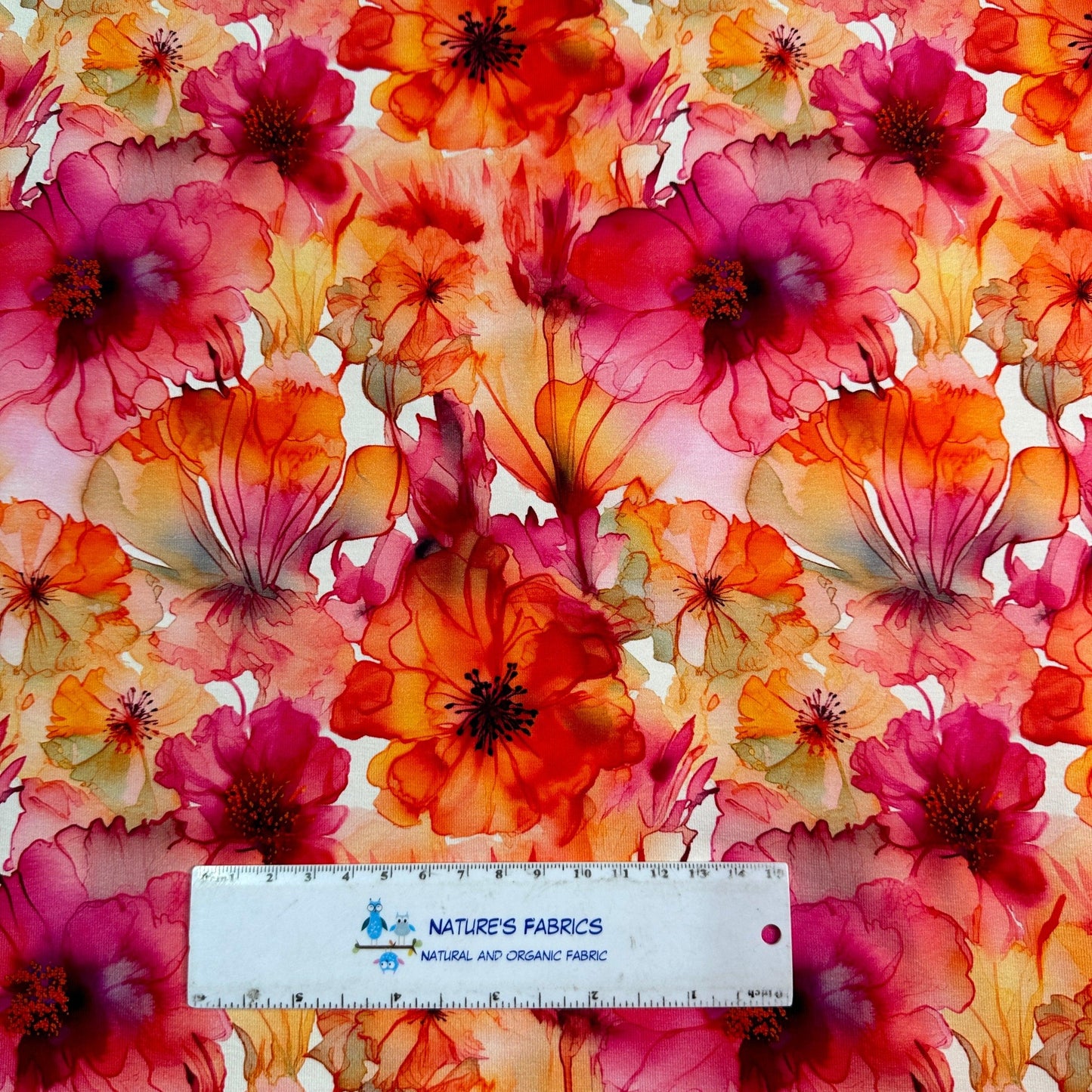 Floral Orange Alcohol Ink on Bamboo/Spandex Jersey Fabric - Nature's Fabrics