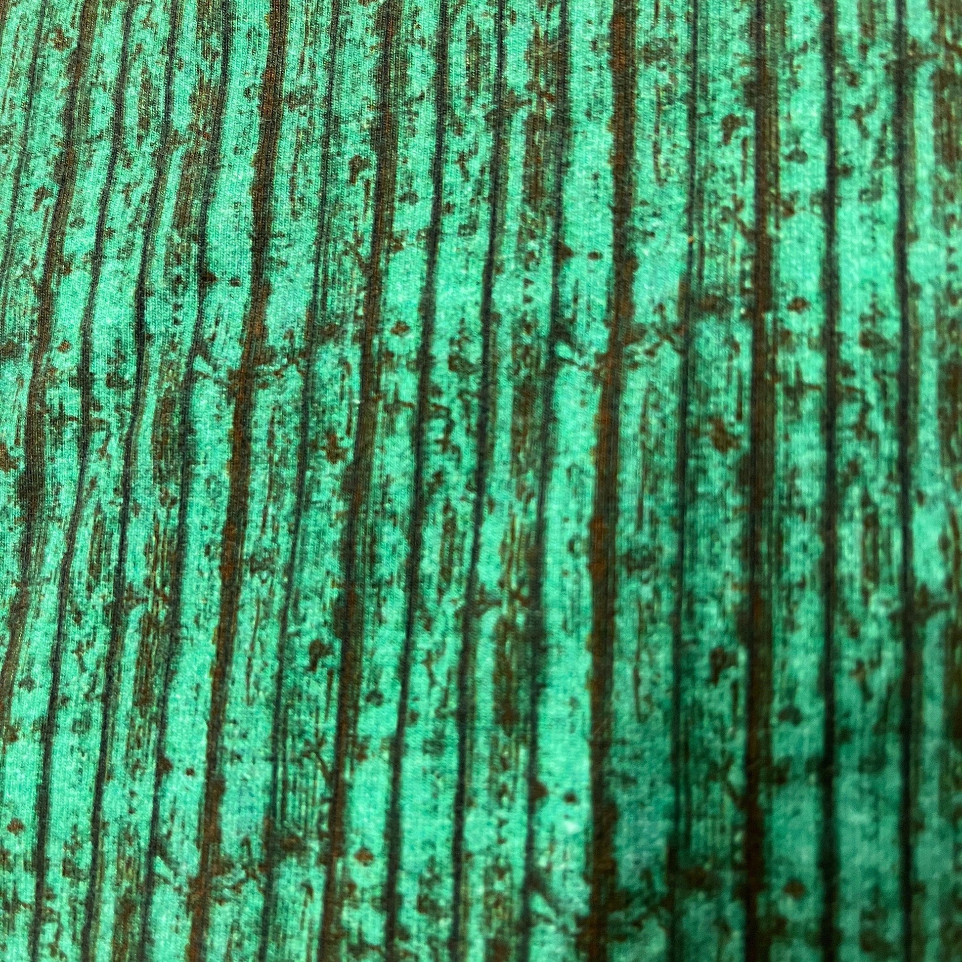 Green Boards on White Cotton/Spandex Jersey Fabric - Nature's Fabrics