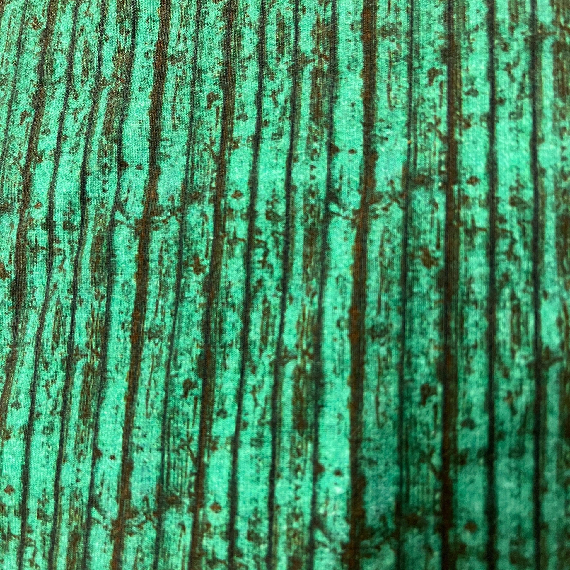 Green Boards on White Cotton/Spandex Jersey Fabric - Nature's Fabrics