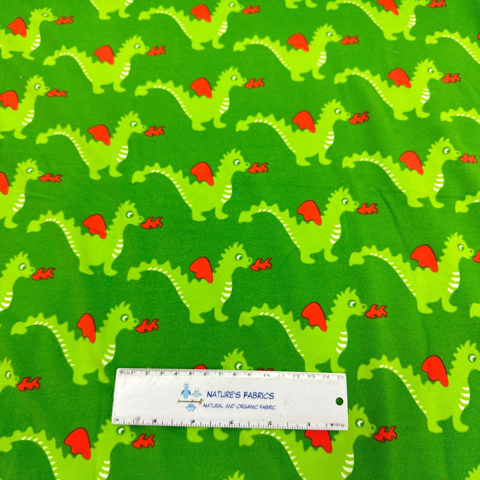Green Dragons on Green Organic Cotton/Spandex Jersey Fabric - Nature's Fabrics