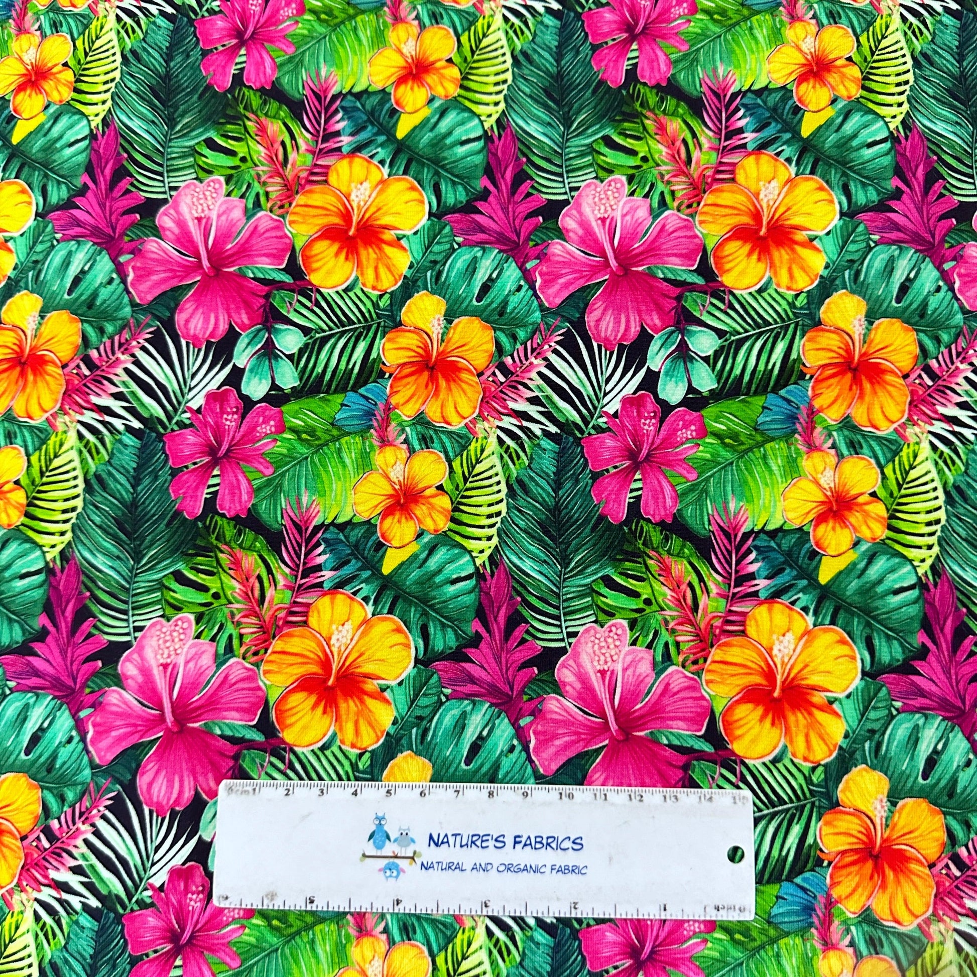 Island Flowers on Black Bamboo/Spandex Jersey Fabric - Nature's Fabrics