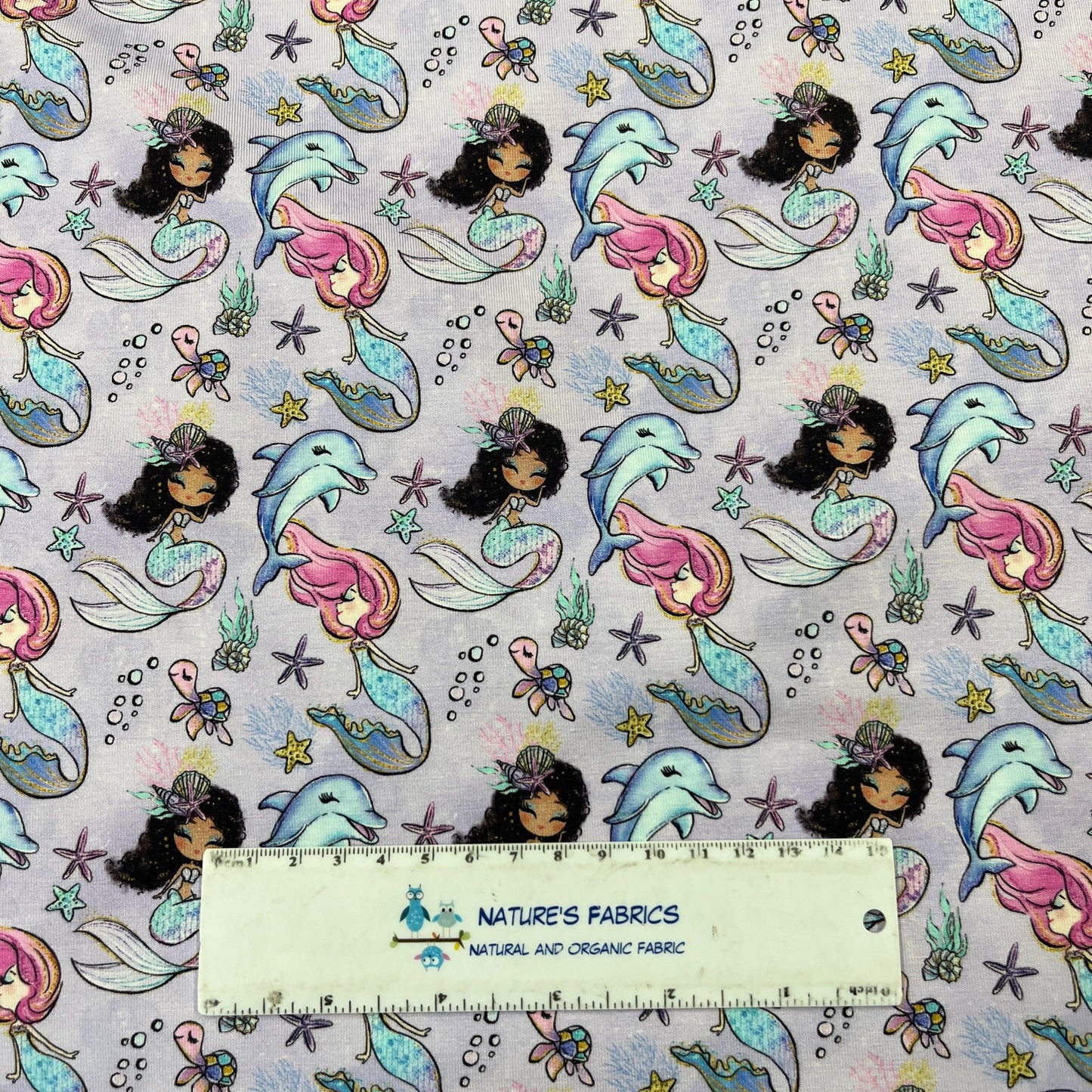 Mermaids on Purple Bamboo/Spandex Jersey Fabric - Nature's Fabrics