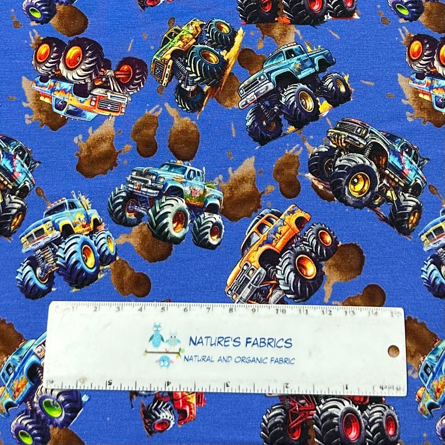 Monster Trucks on Organic Cotton/Spandex Jersey Fabric - Nature's Fabrics