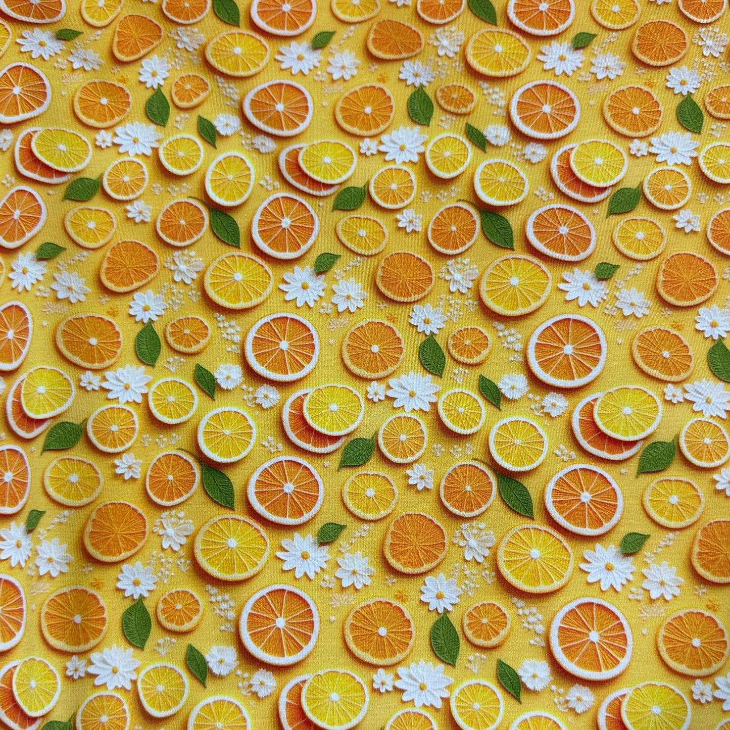 Orange Slices and Daisies on Bamboo/Spandex Jersey Fabric - Nature's Fabrics