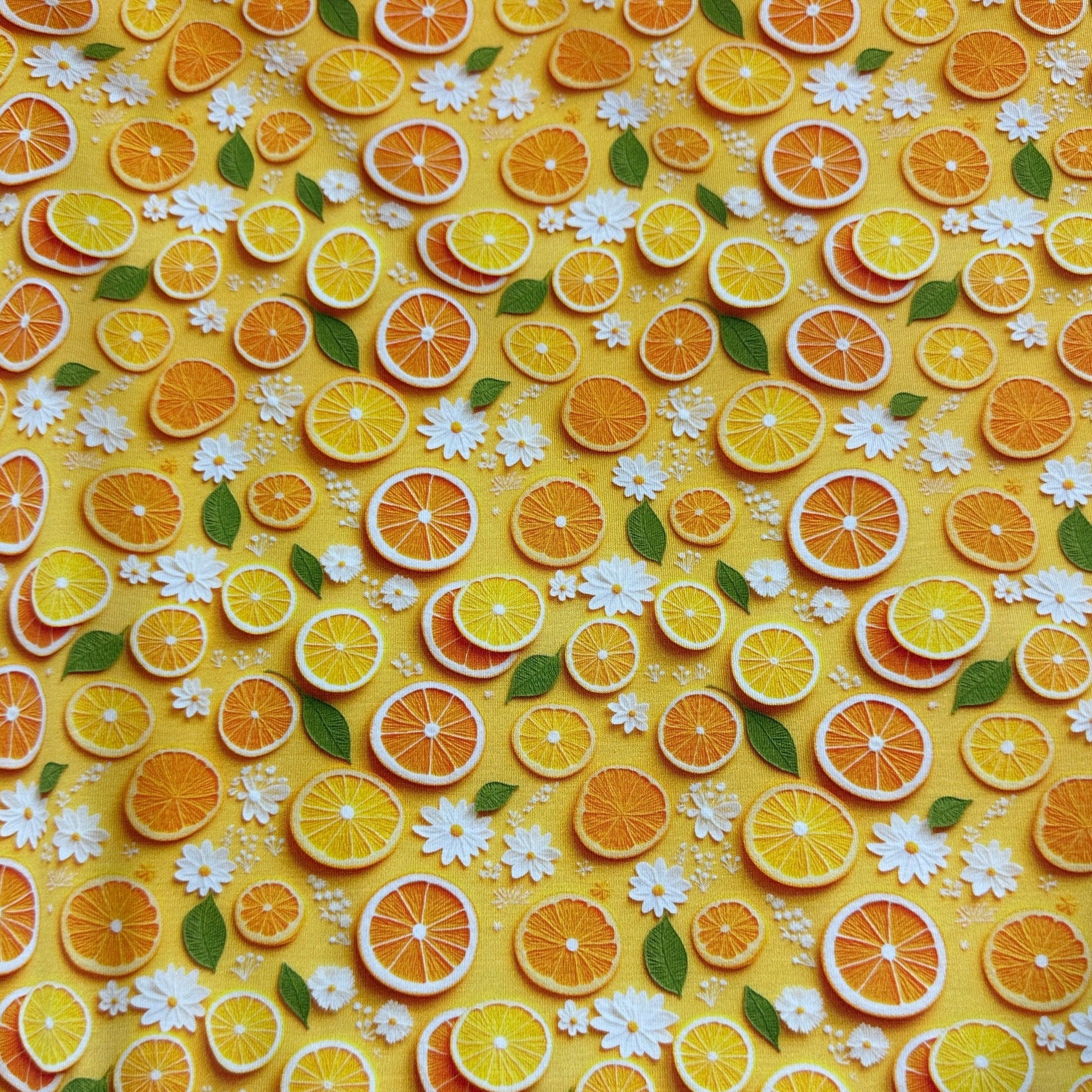 Orange Slices and Daisies on Bamboo/Spandex Jersey Fabric - Nature's Fabrics