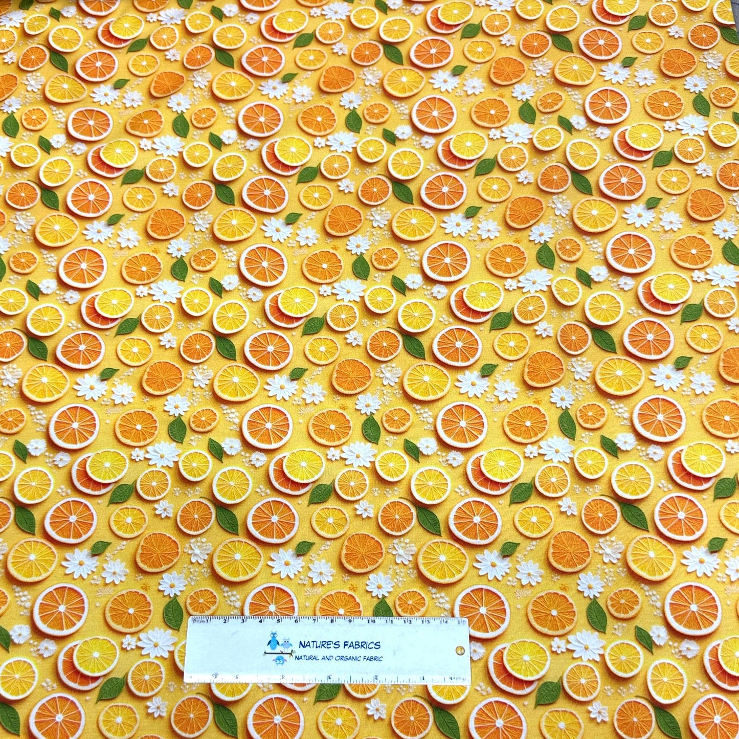 Orange Slices and Daisies on Bamboo/Spandex Jersey Fabric - Nature's Fabrics