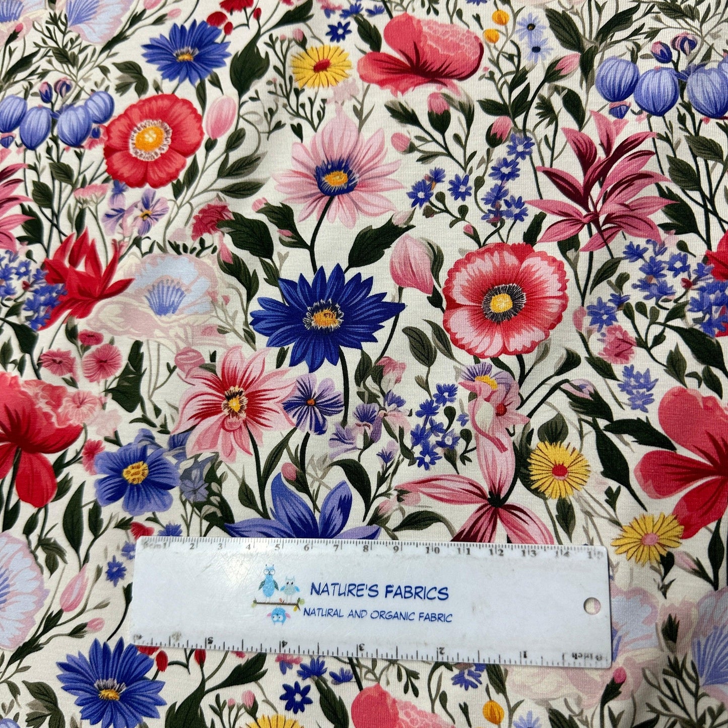 Pink and Blue Flowers on Ivory Bamboo/Spandex Jersey Fabric - Nature's Fabrics