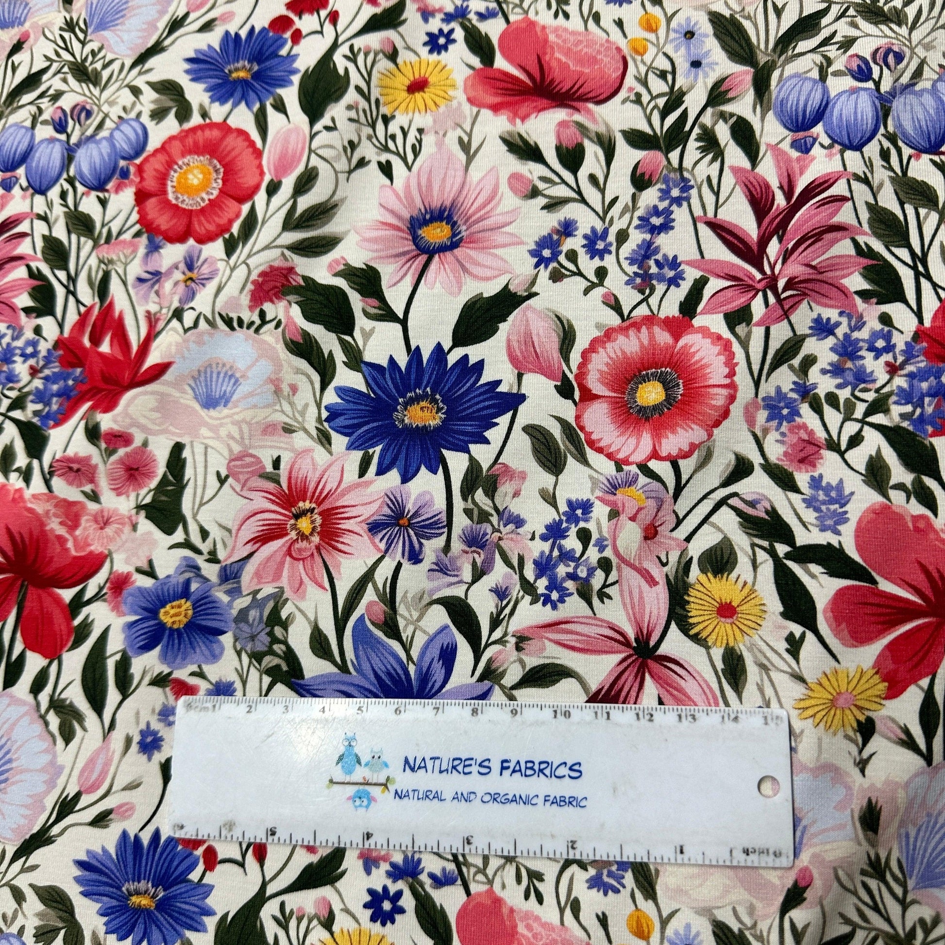 Pink and Blue Flowers on Ivory Bamboo/Spandex Jersey Fabric - Nature's Fabrics