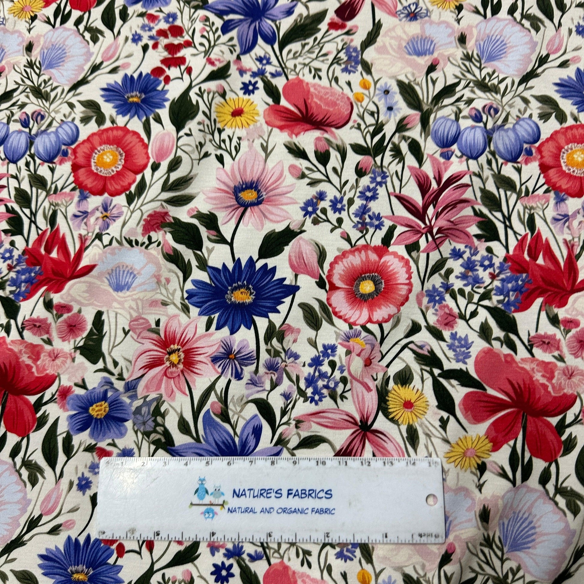 Pink and Blue Flowers on Ivory Bamboo/Spandex Jersey Fabric - Nature's Fabrics