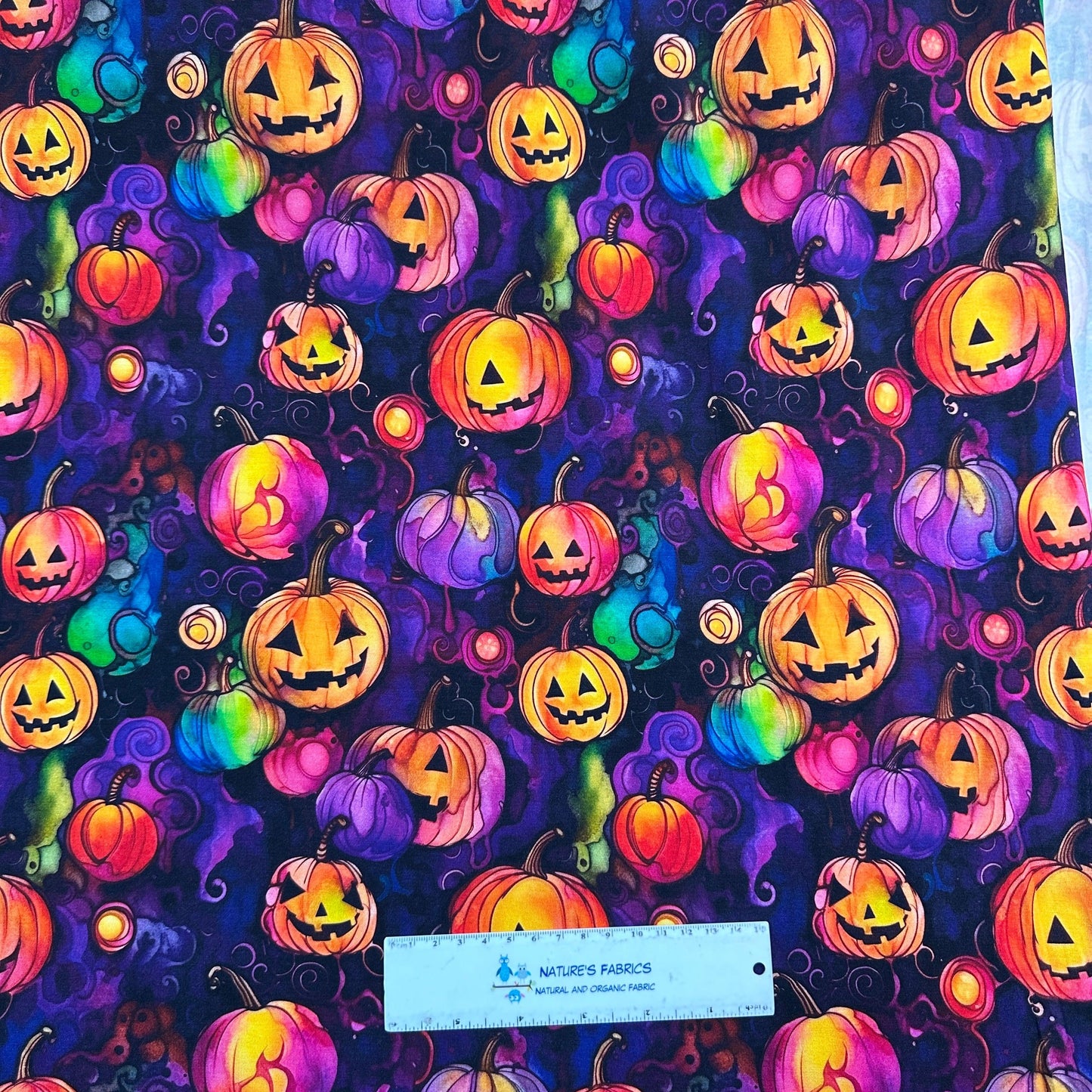 Pumpkins on Purple Bamboo/Spandex Jersey Fabric - Nature's Fabrics