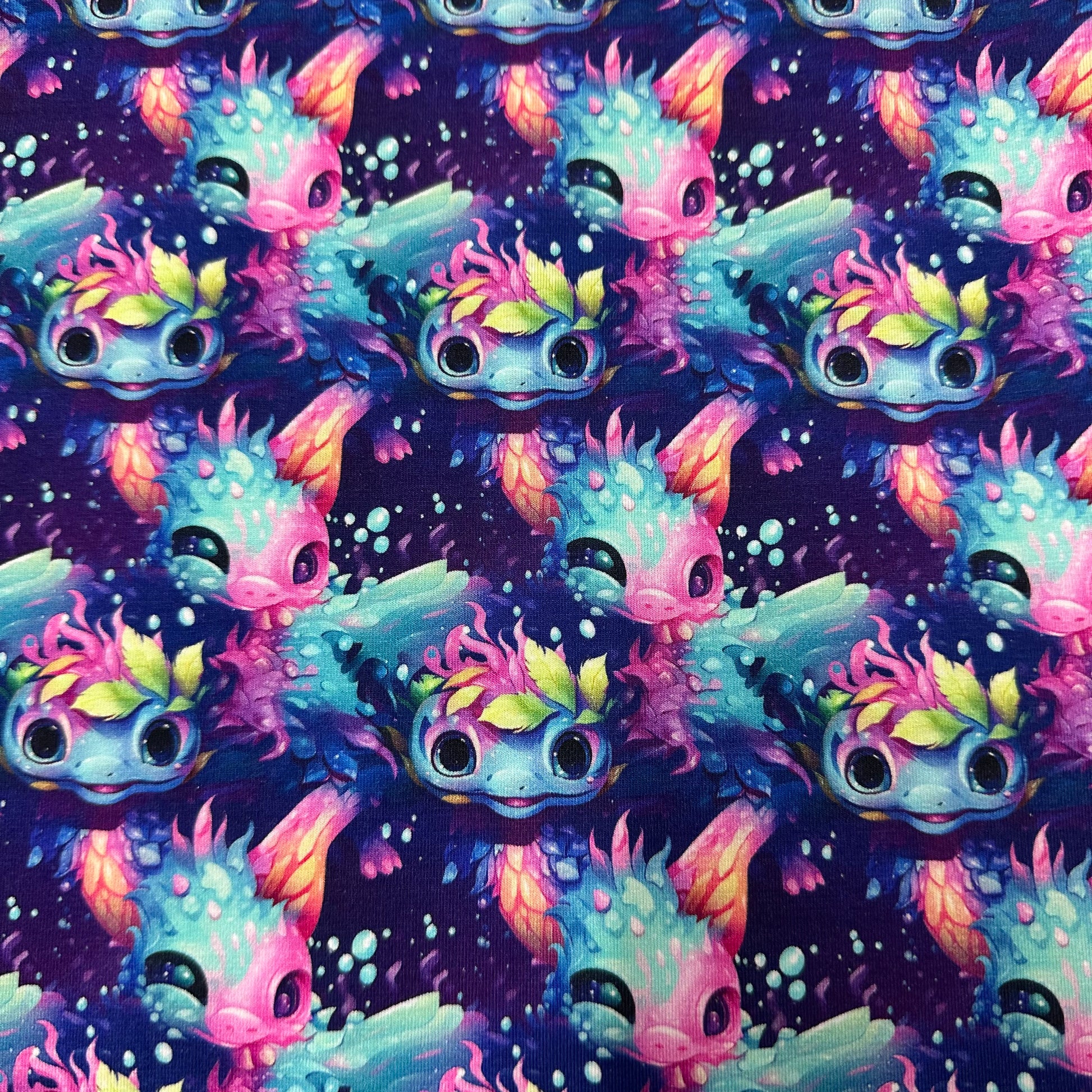 Rainbow Axolotls on Bamboo/Spandex Jersey Fabric - Nature's Fabrics