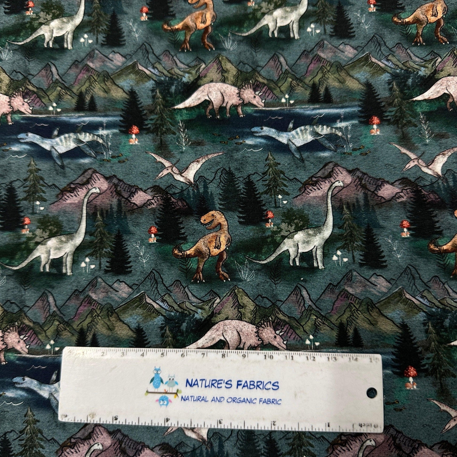 Roaming Dinosaurs on Bamboo/Spandex Jersey Fabric - Nature's Fabrics