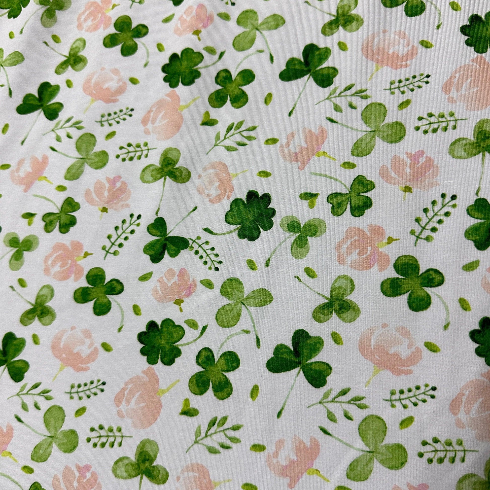 Shamrock and Flowers on White Bamboo/Spandex Jersey Fabric - Nature's Fabrics