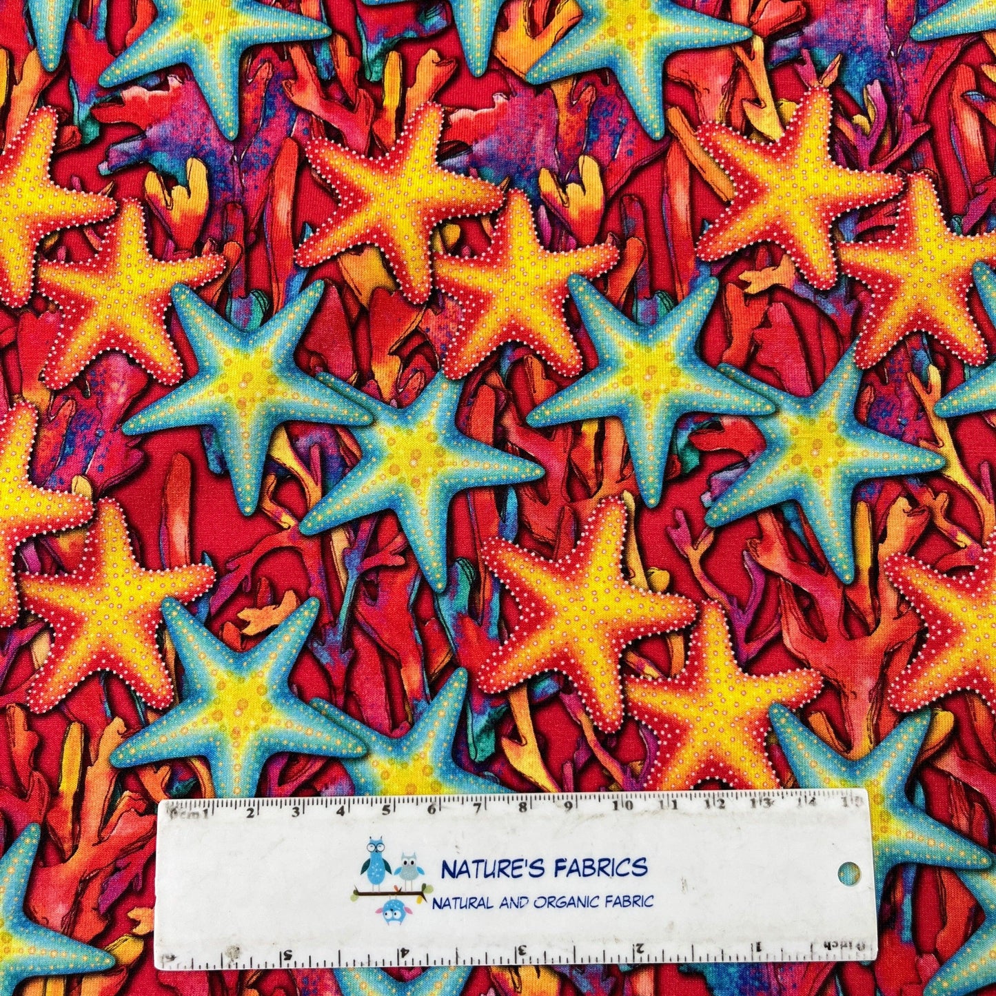 Starfish on Red Bamboo/Spandex Jersey Fabric - Nature's Fabrics