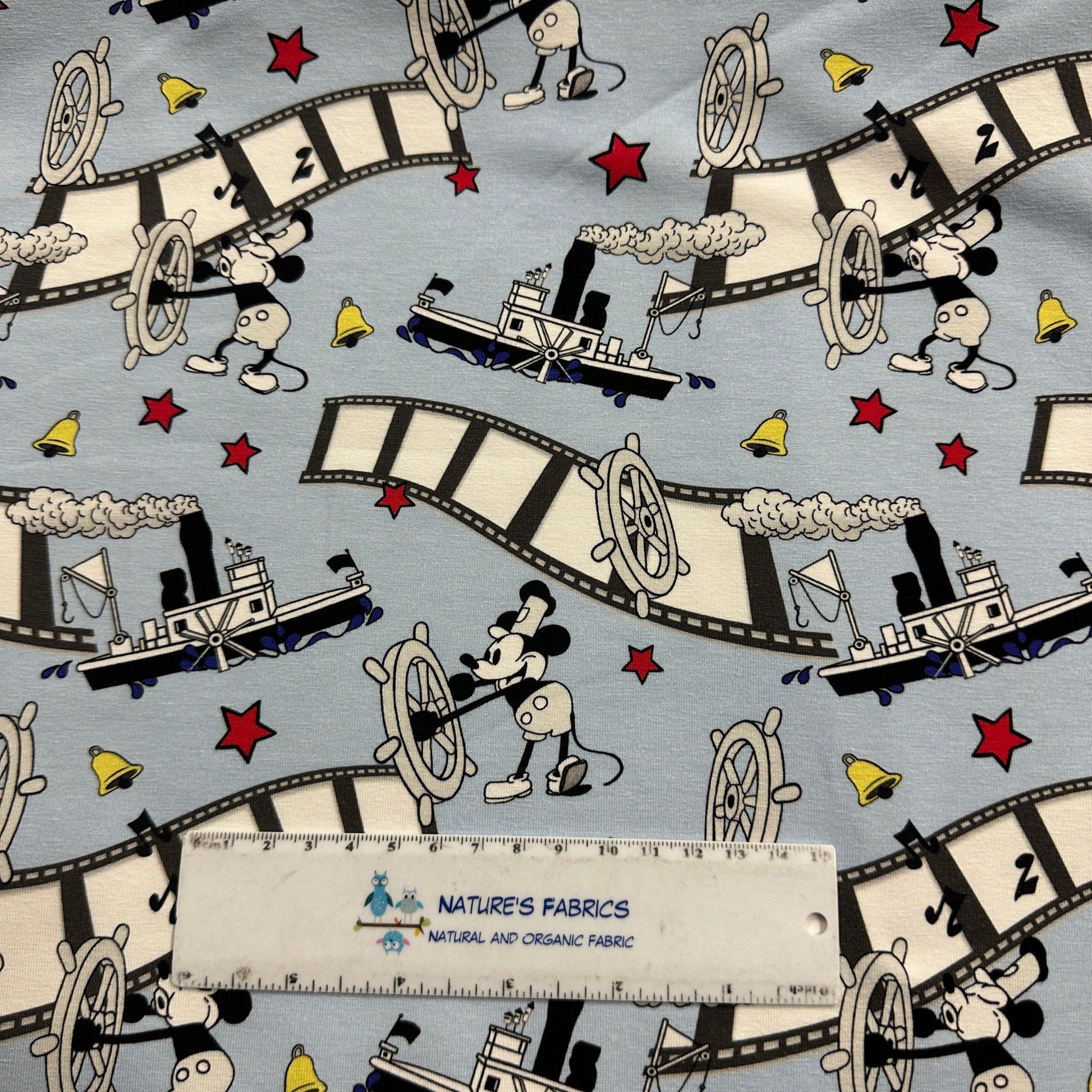 Steamboat Willie on Blue Bamboo/Spandex Jersey Fabric - Nature's Fabrics