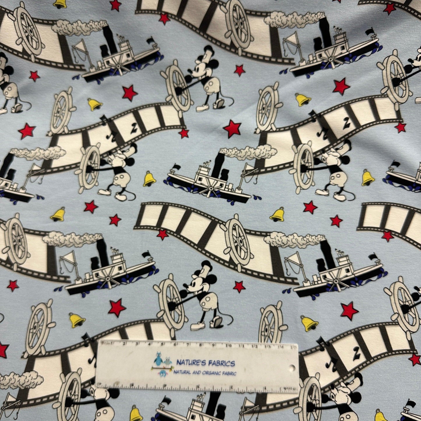 Steamboat Willie on Blue Bamboo/Spandex Jersey Fabric - Nature's Fabrics