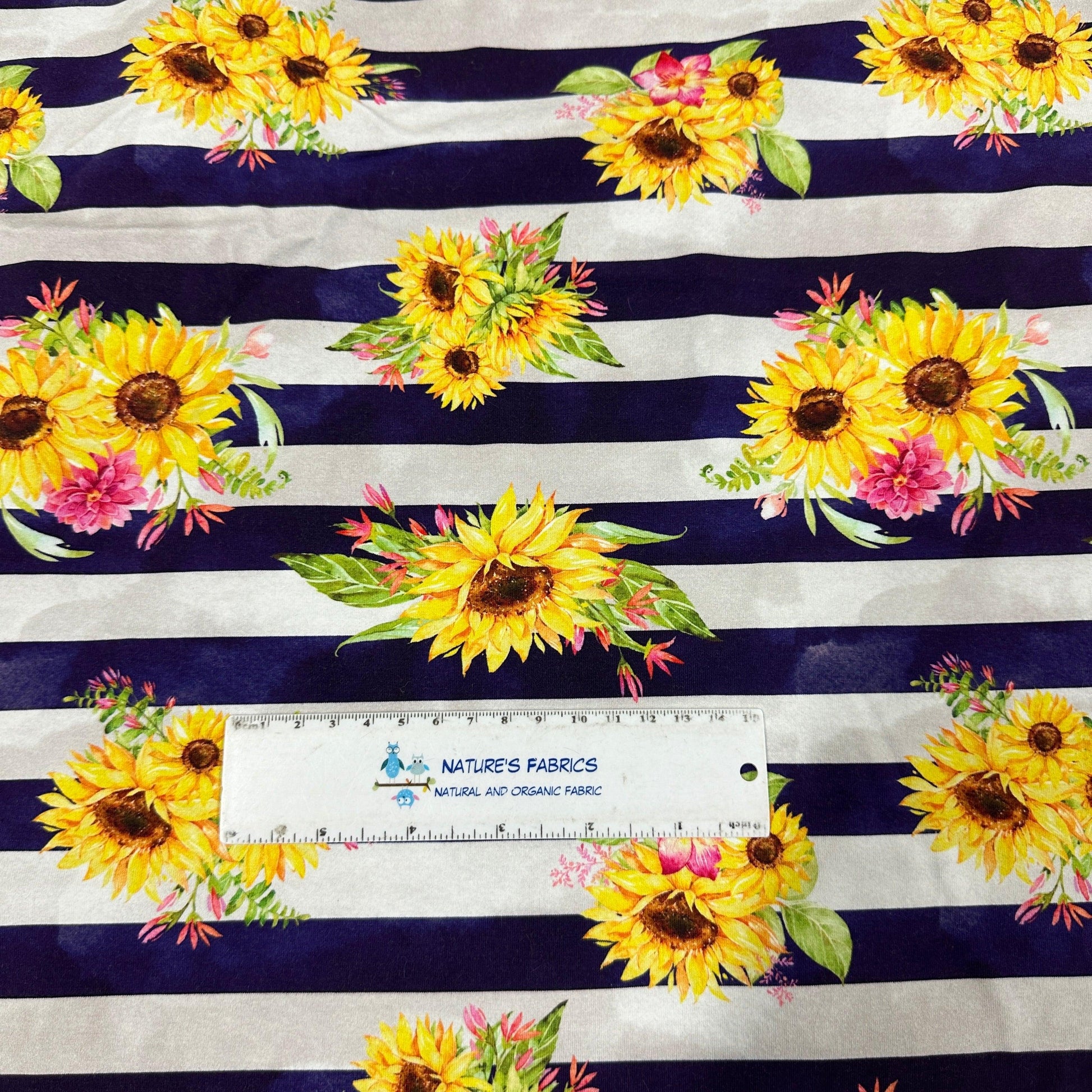 Sunflowers on Navy Stripe Cotton/Spandex Jersey Fabric - Nature's Fabrics