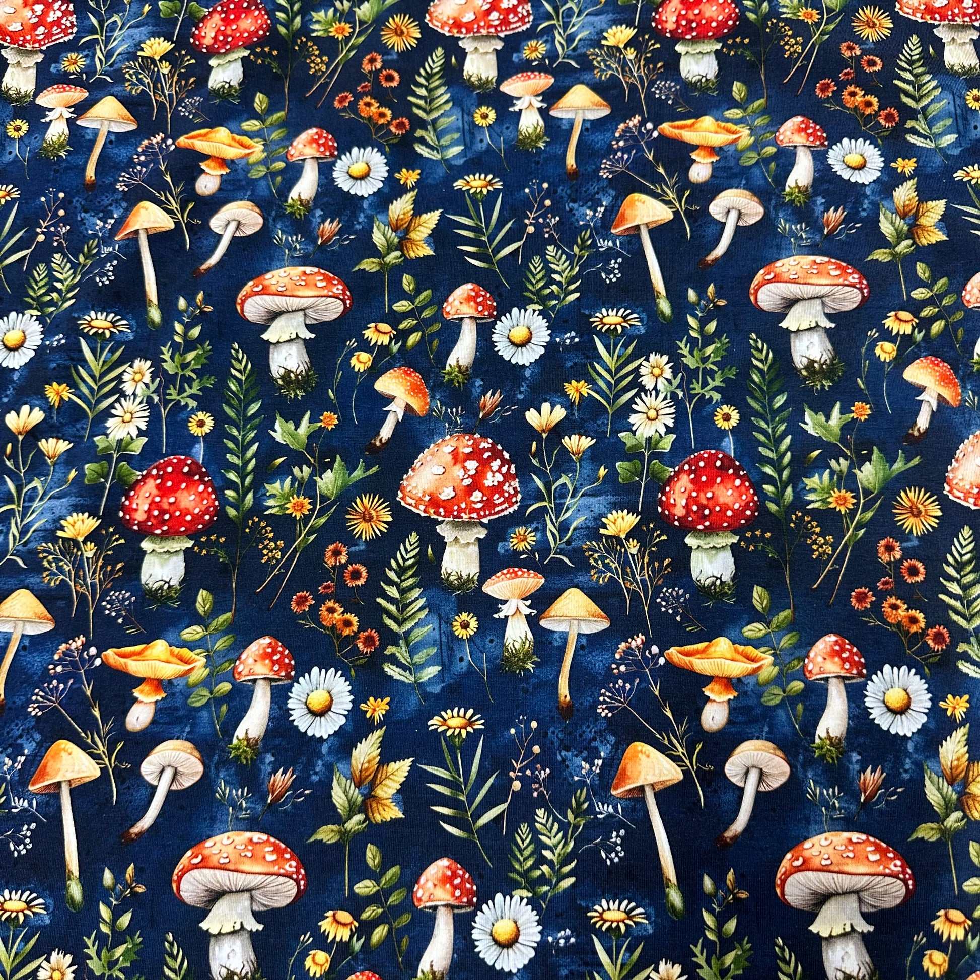 Toadstools on Blue Bamboo/Spandex Jersey Fabric - Nature's Fabrics