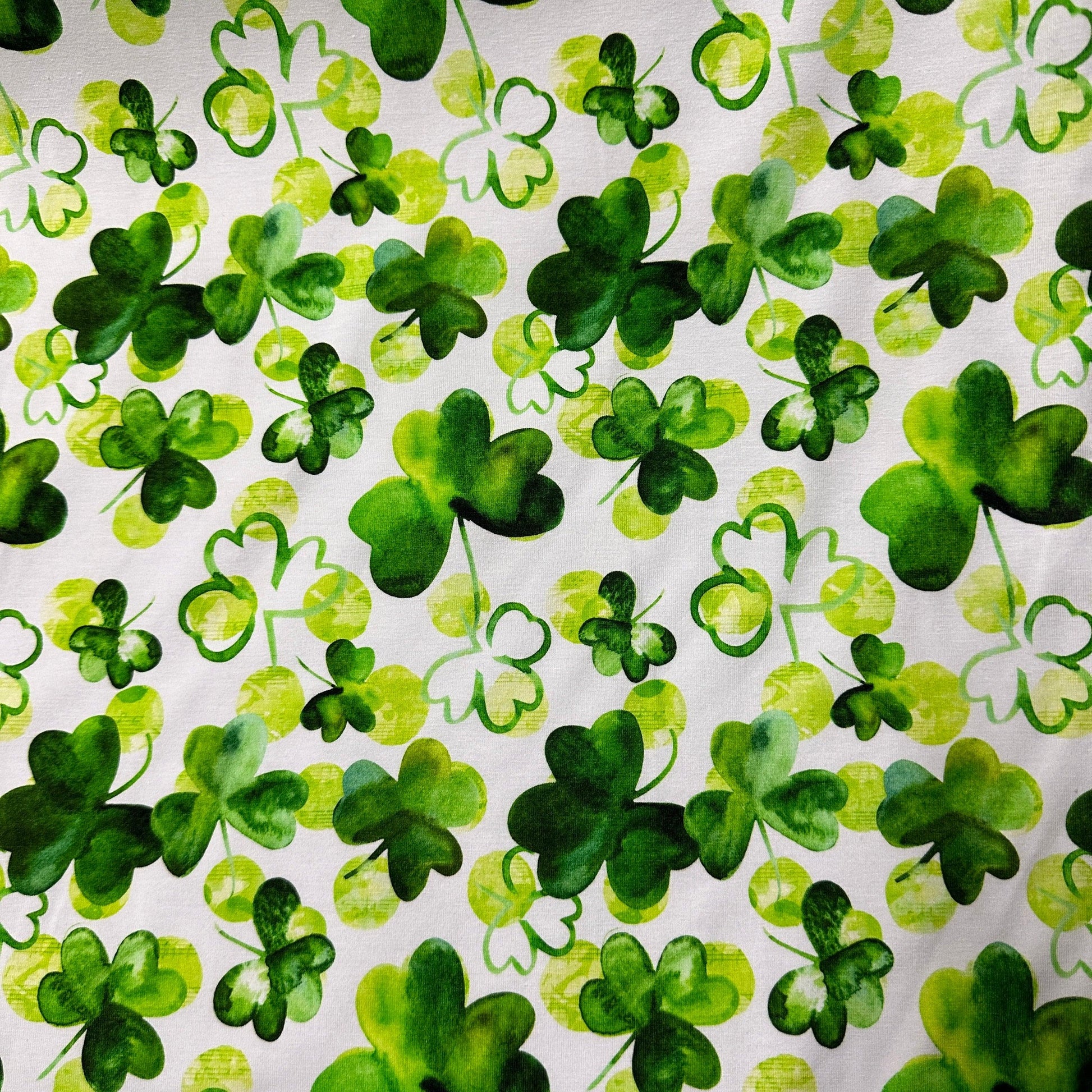 Watercolor Shamrocks on White Bamboo/Spandex Jersey Fabric - Nature's Fabrics