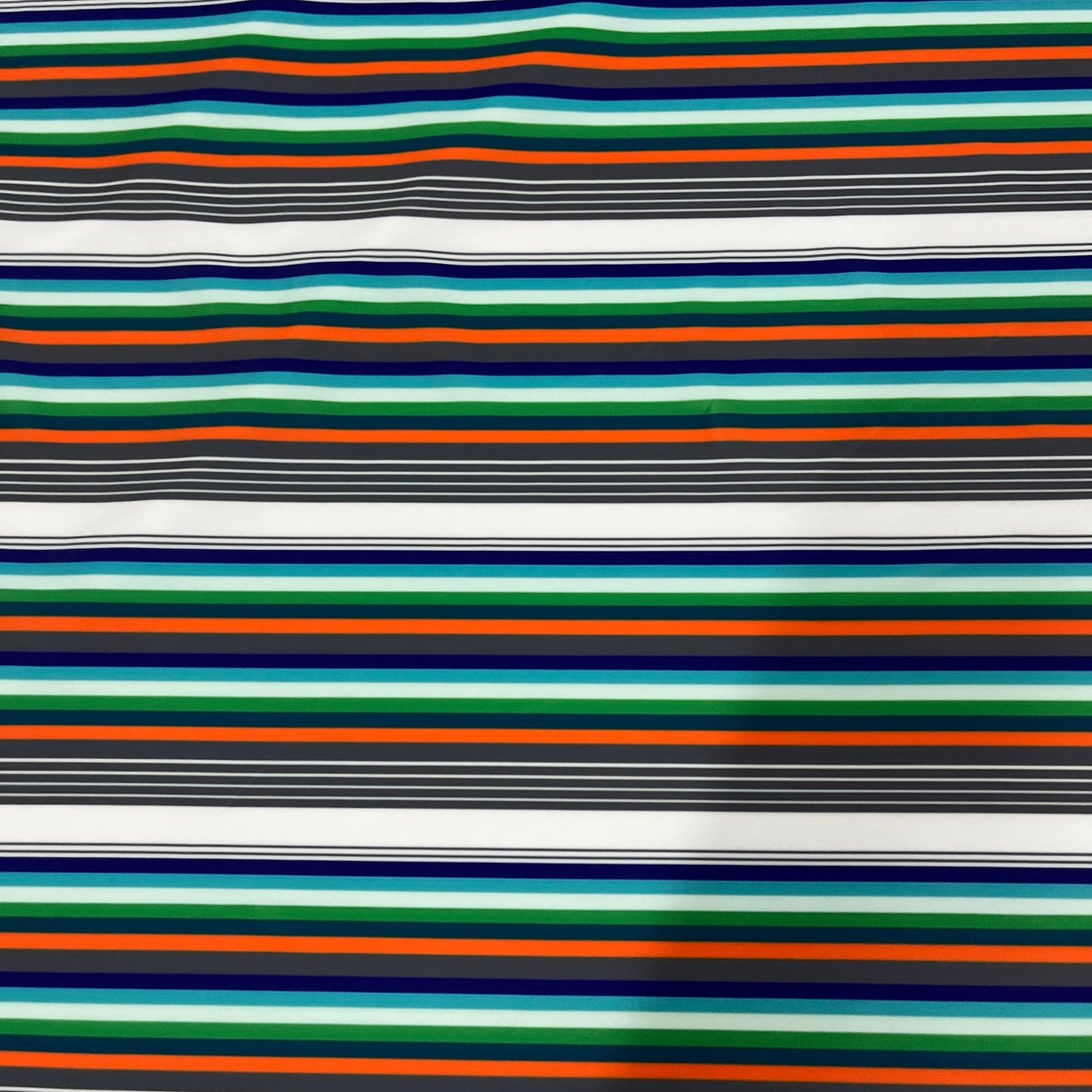 White, Orange and Green Stripes on Athletic Jersey Fabric - Nature's Fabrics