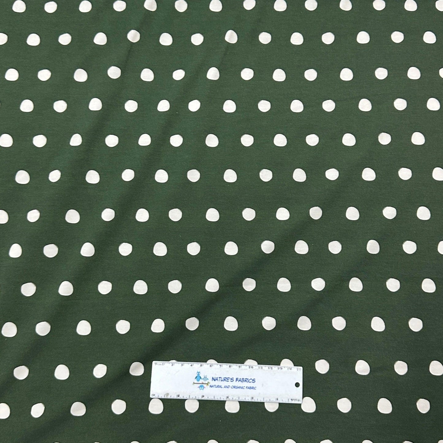 White Polka Dots on Green Bamboo/Spandex Jersey Fabric - Nature's Fabrics
