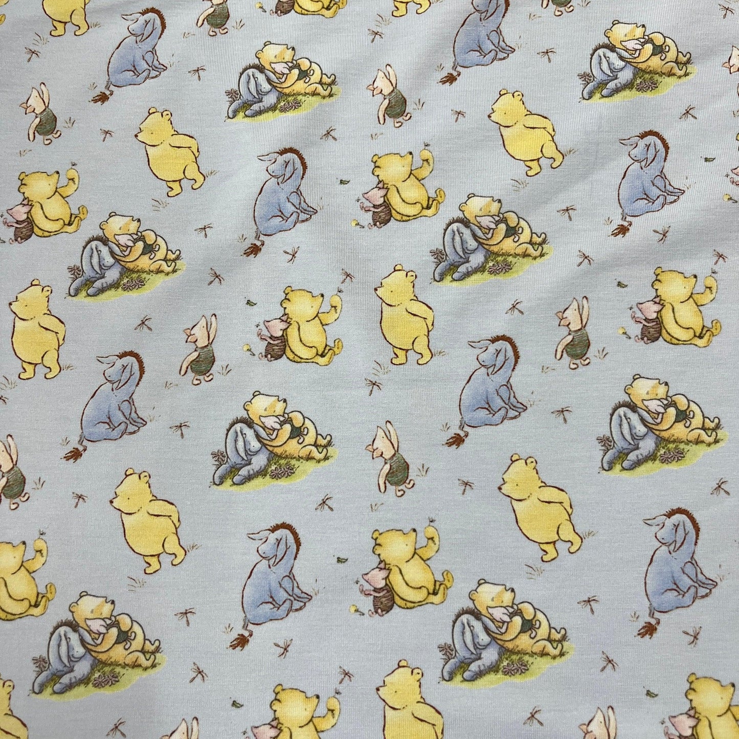 Winnie the Pooh and Friends on Blue Bamboo/Spandex Jersey Fabric - Nature's Fabrics