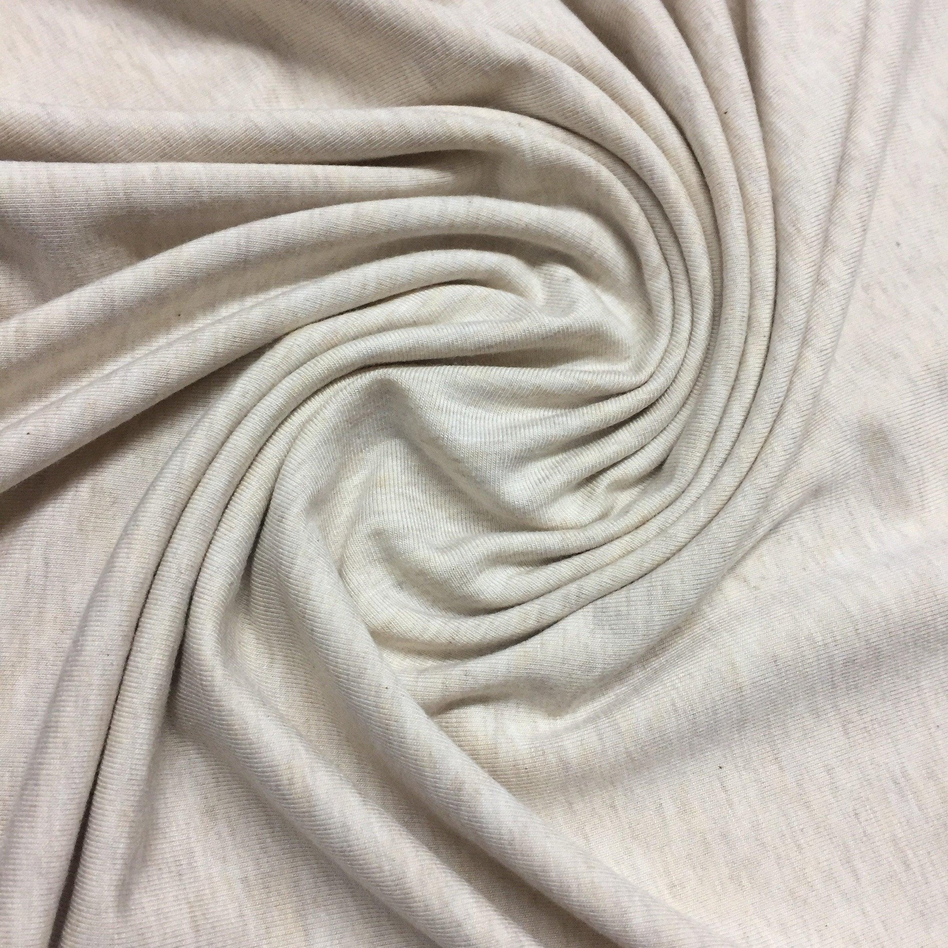 https://naturesfabrics.com/cdn/shop/products/almond-heather-bamboo-stretch-fleece-fabric.jpg?v=1704485012&width=1946