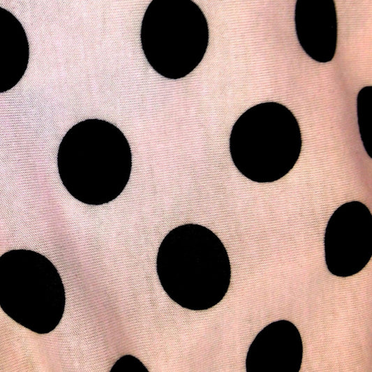 Black Dots on Peach Cotton/Poly Jersey Fabric - Nature's Fabrics