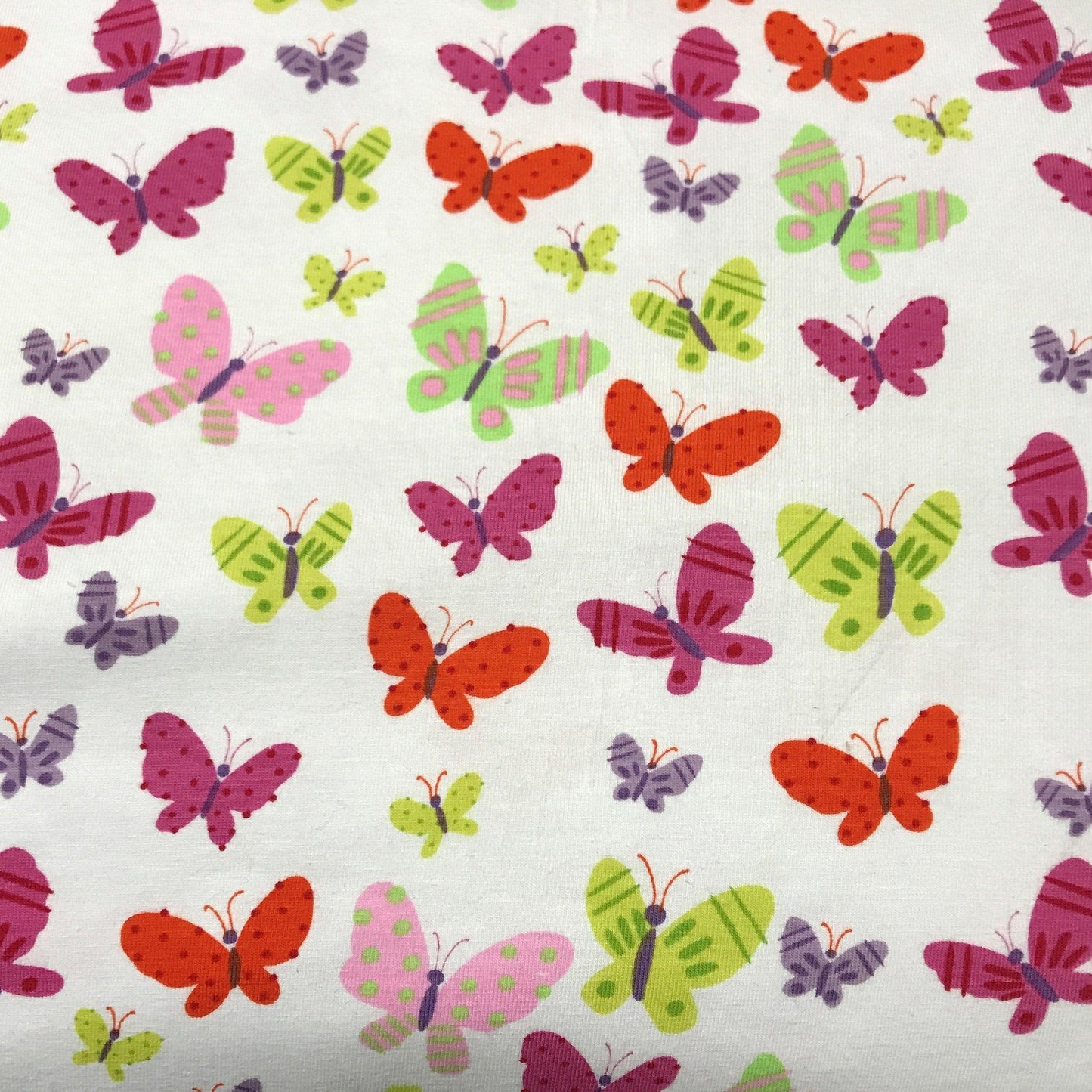 Butterflies on White Cotton/Spandex Jersey Fabric - Nature's Fabrics