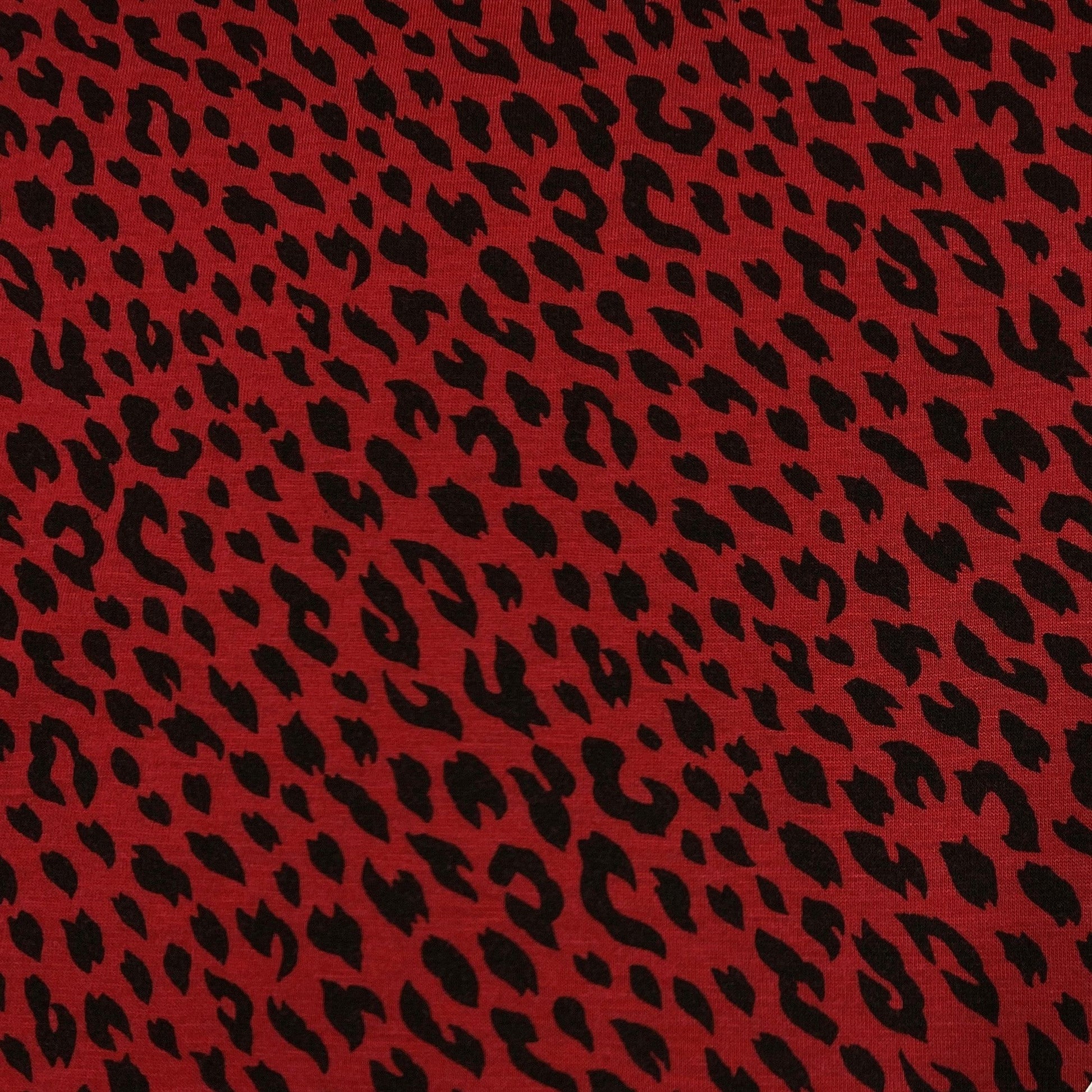 Cheetah on Red Cotton Jersey Fabric - Nature's Fabrics
