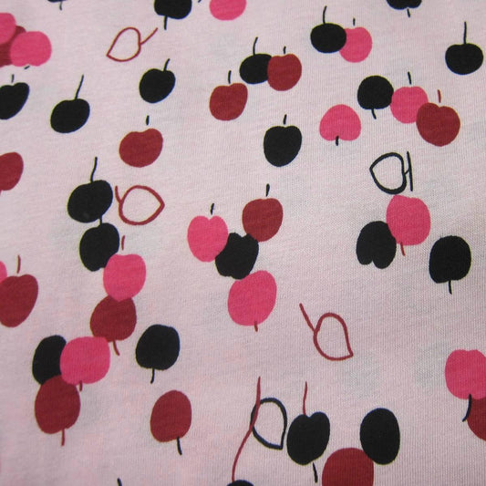 Cherry Toss on Pink Cotton Jersey Fabric - Nature's Fabrics